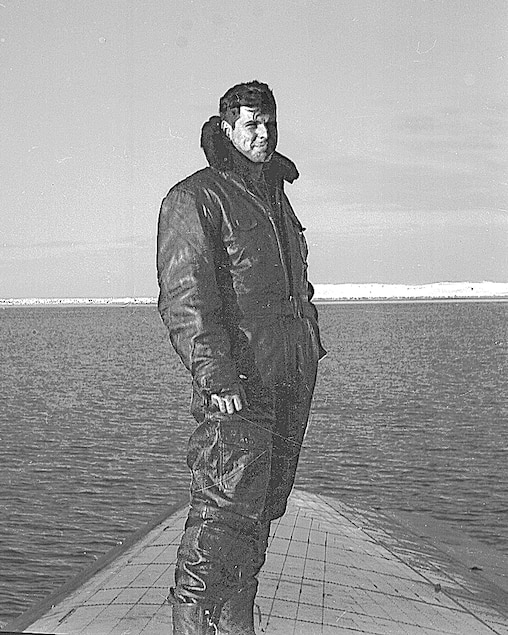 Gene Litz standing on the wing of his aircraft in Antarctica during Operation
Highjump.