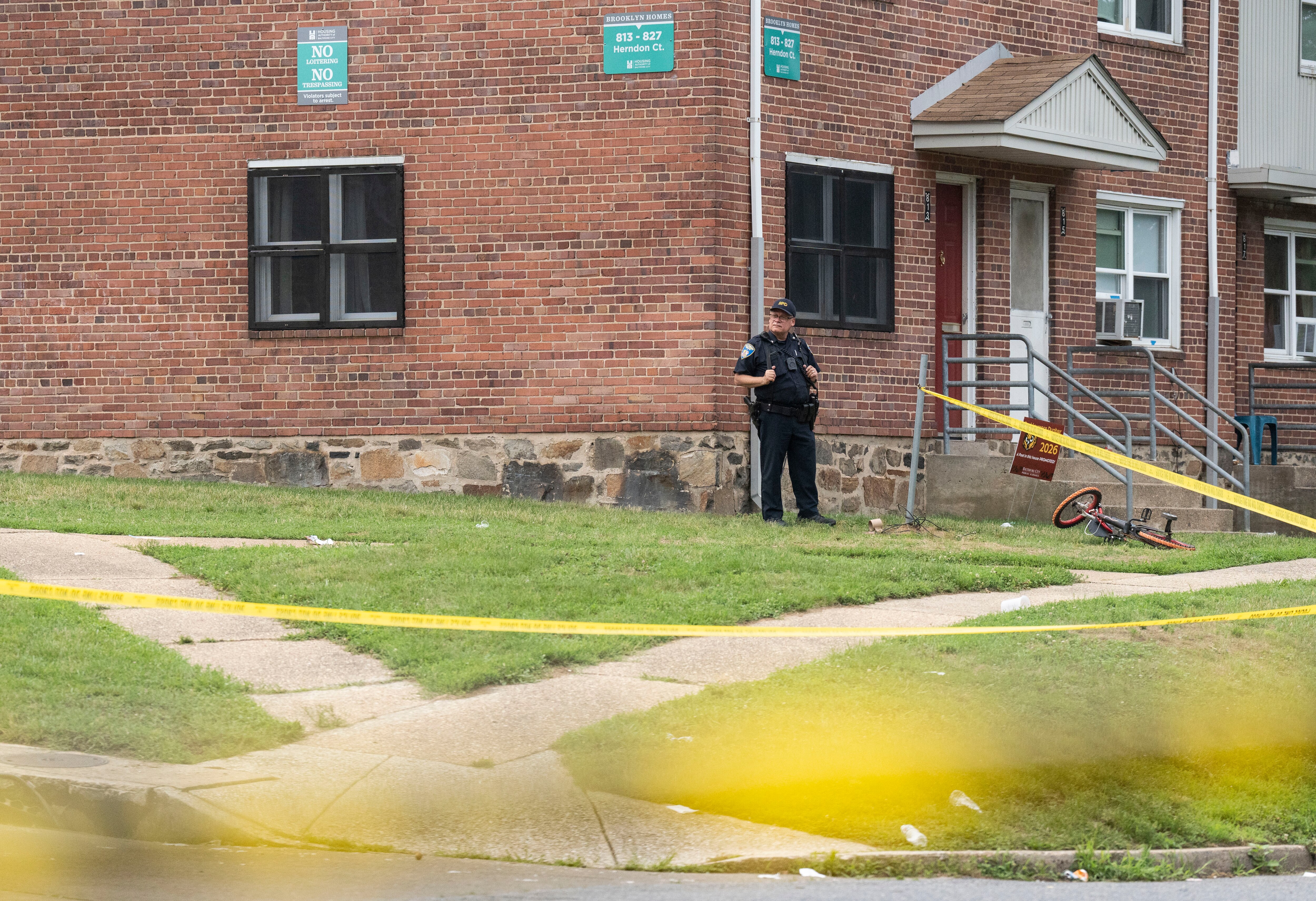 Baltimore Police investigate a mass shooting at Brooklyn Homes on July 2, 2023.