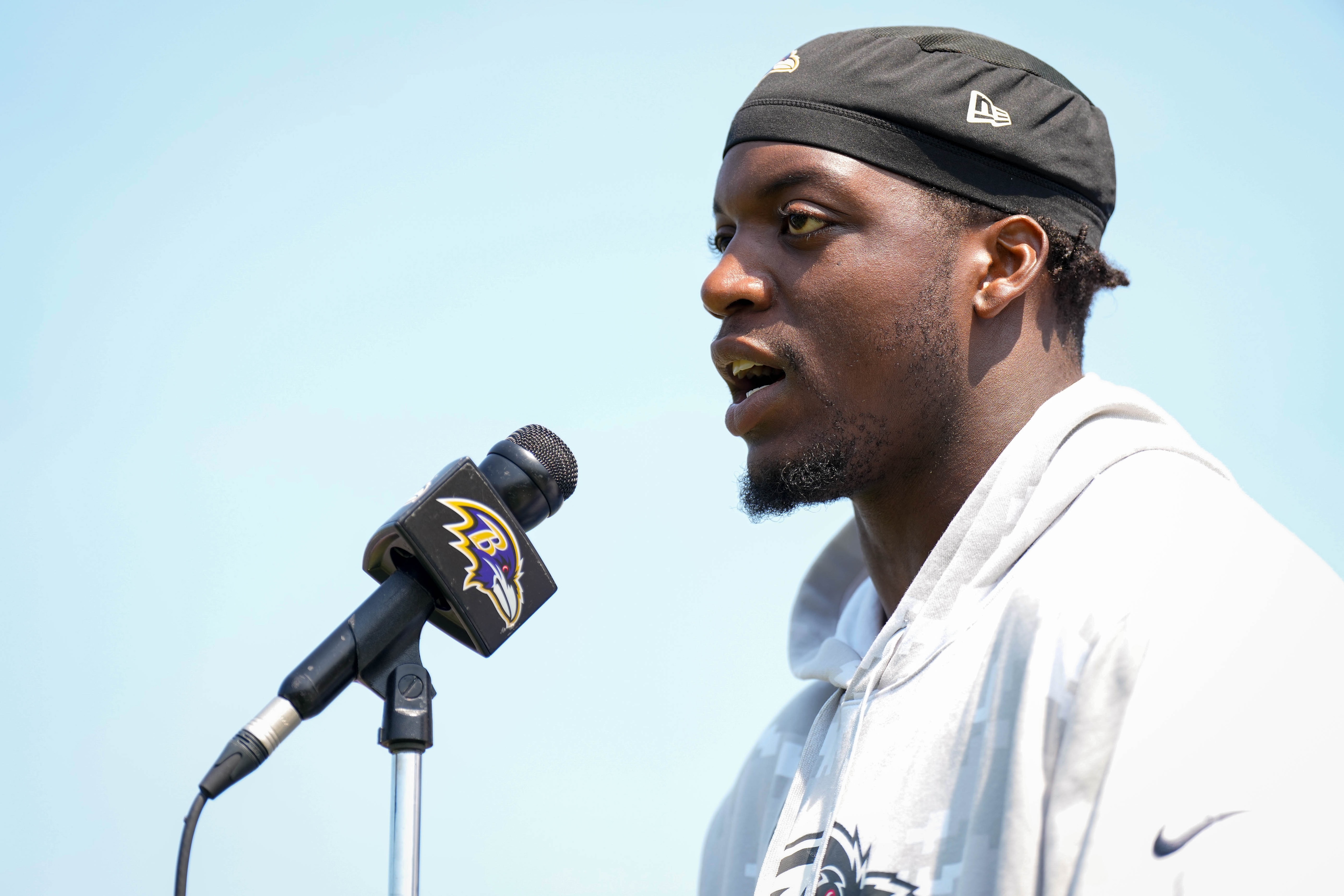 Baltimore Ravens linebacker Adisa Isaac (50) takes questions from reporters following the Ravens’ organized team activities at the Under Armour Performance Center in Owings Mills, Md. on Wednesday, June 11, 2025.