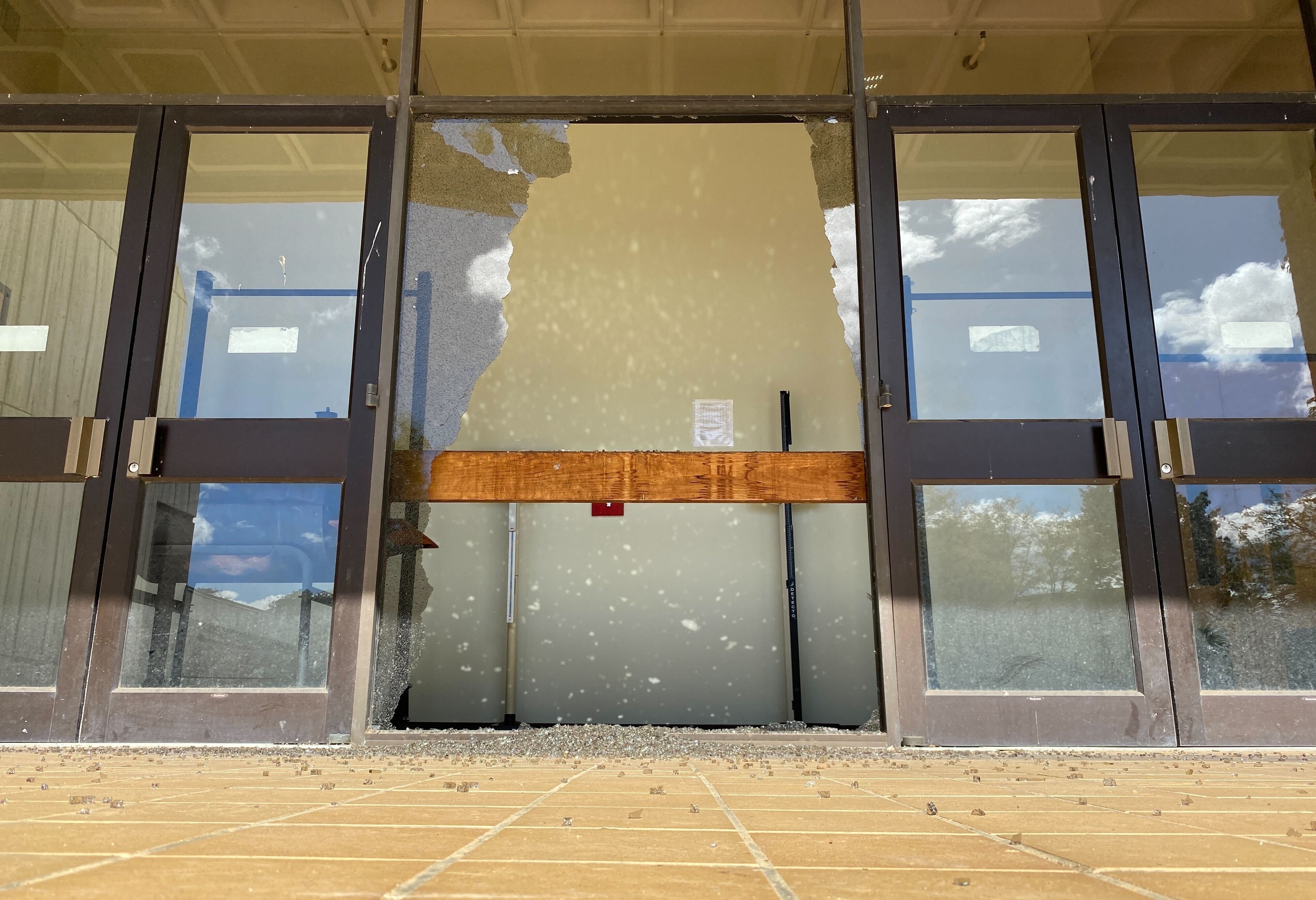 Shattered glass at a Bowie State University building where a shooting was reported Saturday night.