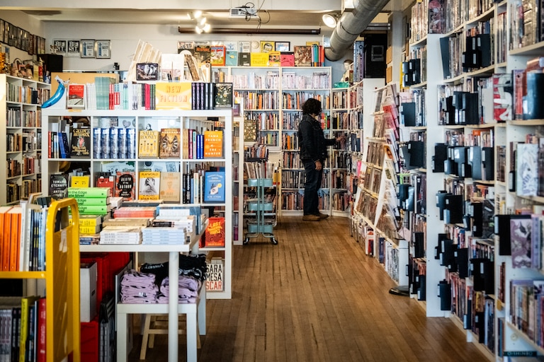 A customer shops at Atomic Books in Hampden on Friday, January 17, 2025.