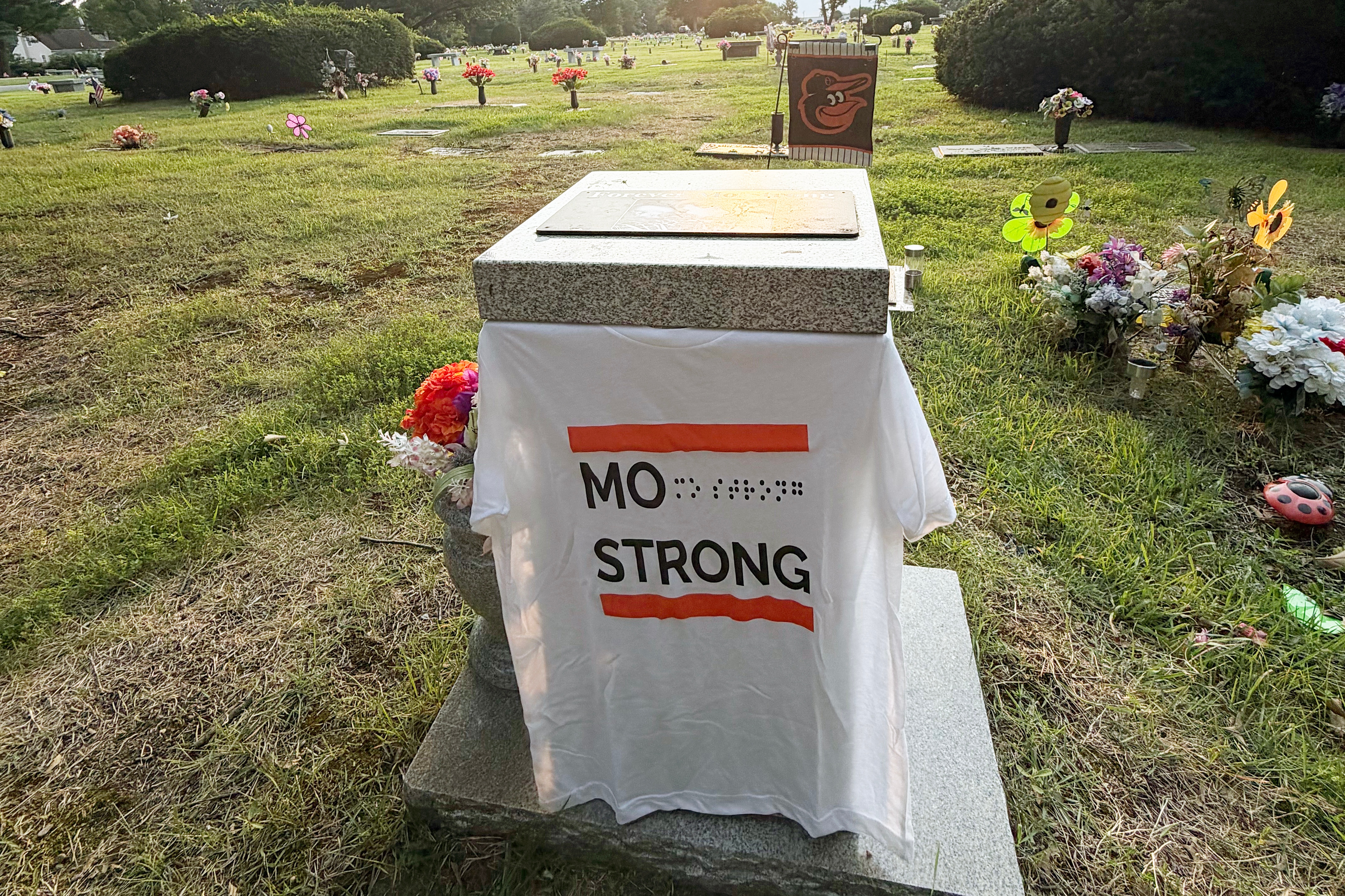 Shortly before the six year anniversary of Mo Gaba’s death, Eric Arditti, an Orioles fan who grew close to Gaba, visited his grave at Glen Haven Memorial Park in Glen Burnie to lay out a new t-shirt honoring Gaba.
