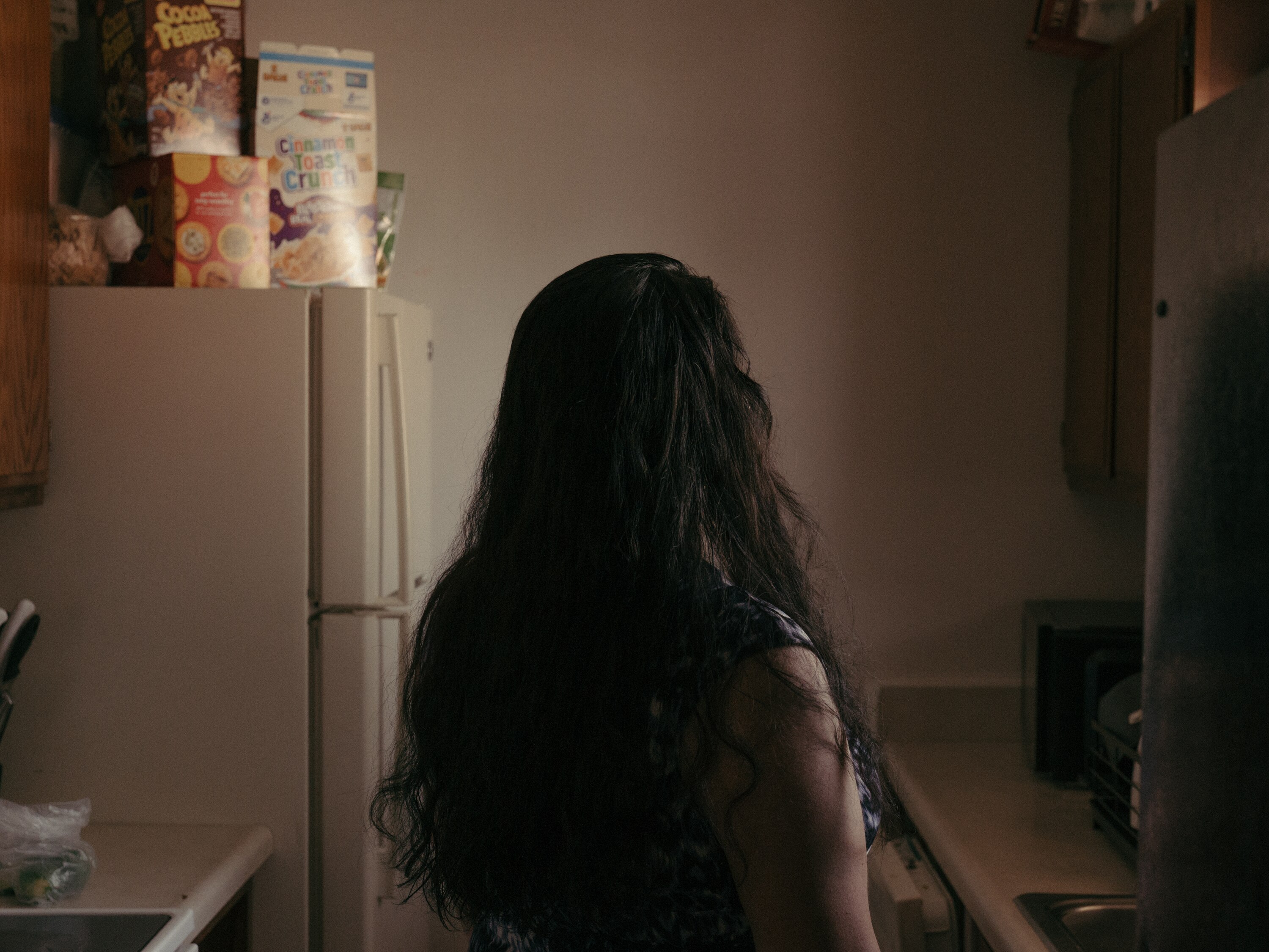 D.N.N. in her kitchen in the Frederick area. She spent 10 months in U.S. Immigration and Customs Enforcement detention at four different facilities.