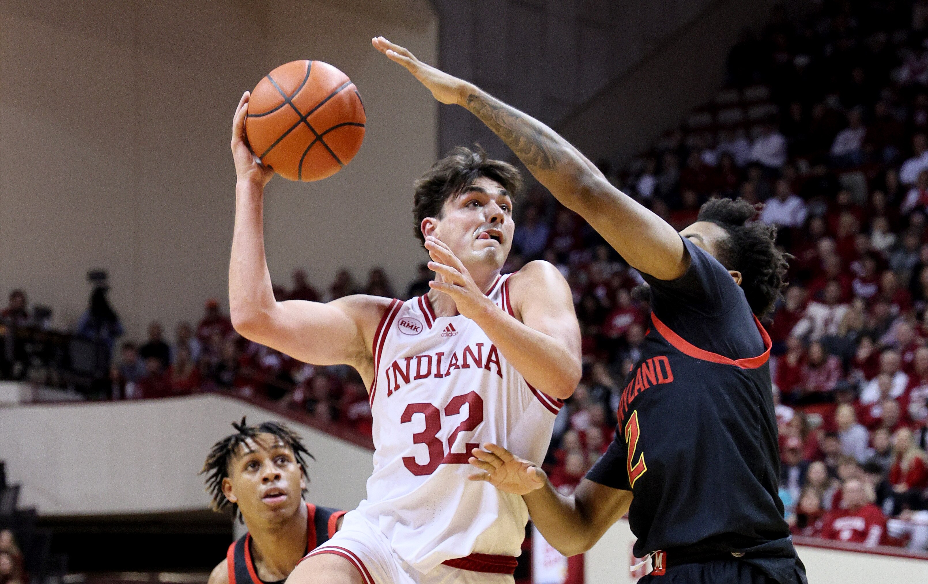 Indiana's Trey Galloway shoots against Maryland defender Jahari Long during the Hoosiers' 65-53 win Friday night.