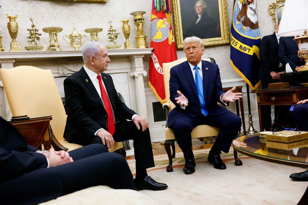 U.S. President Donald Trump, accompanied by Israeli Prime Minister Benjamin Netanyahu (L) speaks during a meeting in the Oval Office of the White House on February 04, 2025.
