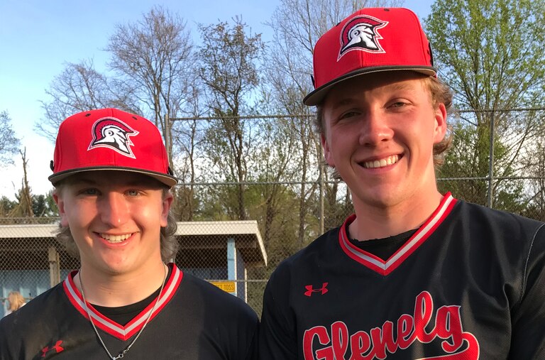 Logan Puscheck (left) and DJ Stolba helped Glenelg maintain a share of first place in the Howard County baseball league Tuesday. Stolba had a home run and drove in 3 runs and Puscheck accounted for the game winning RBI in a 4-run sixth inning rally as the No. 6 Gladiators defeated 10th-ranked River Hill, 8-7, in Clarksville.