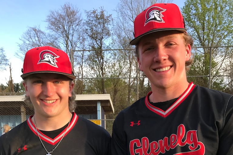 Logan Puscheck (left) and DJ Stolba helped Glenelg maintain a share of first place in the Howard County baseball league Tuesday. Stolba had a home run and drove in 3 runs and Puscheck accounted for the game winning RBI in a 4-run sixth inning rally as the No. 6 Gladiators defeated 10th-ranked River Hill, 8-7, in Clarksville.