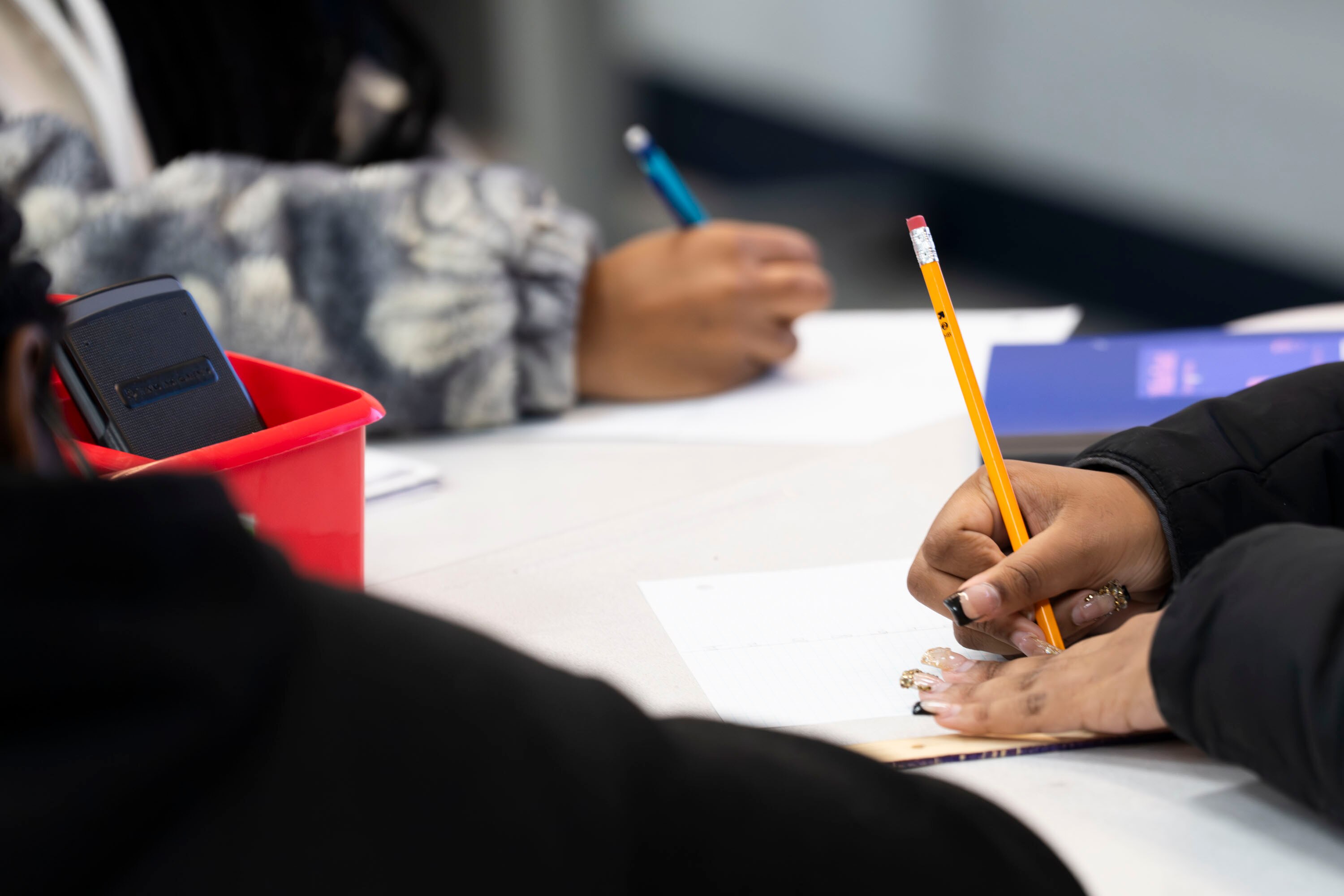 DECEMBER 11, 2025 - Students in Yongsul Cho's Algebra I class at Greenbelt Middle School complete function problems during their daily class.
