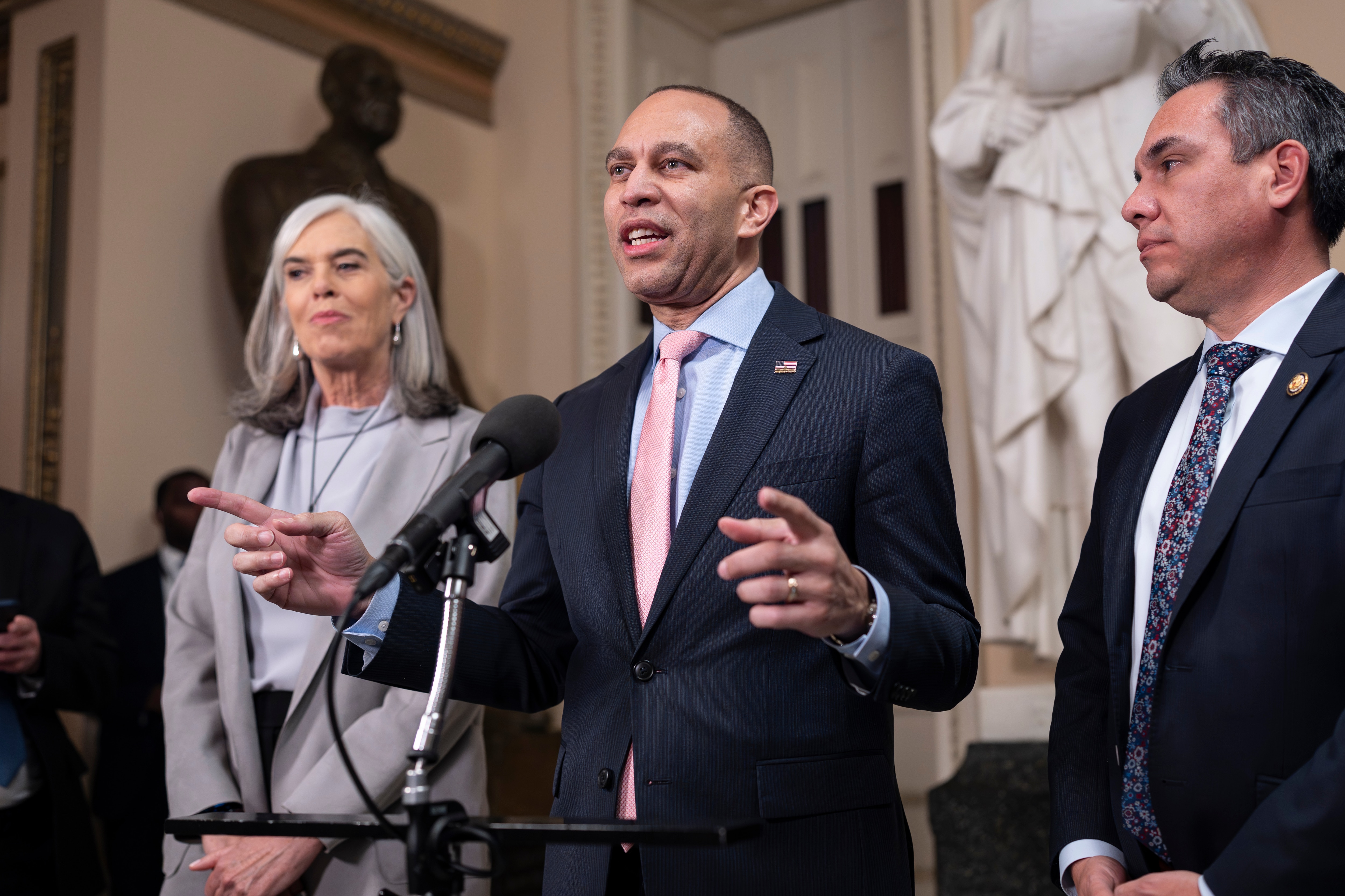 House Minority Leader Hakeem Jeffries, D-N.Y., joined by Rep. Katherine Clark, D-Mass., left, and Rep. Pete Aguilar, D-Calif., speaks to reporters just after the House passed legislation that extends expired health care subsidies for those who get coverage through the Affordable Care Act, at the Capitol in Washington, Thursday, Jan. 8, 2026.