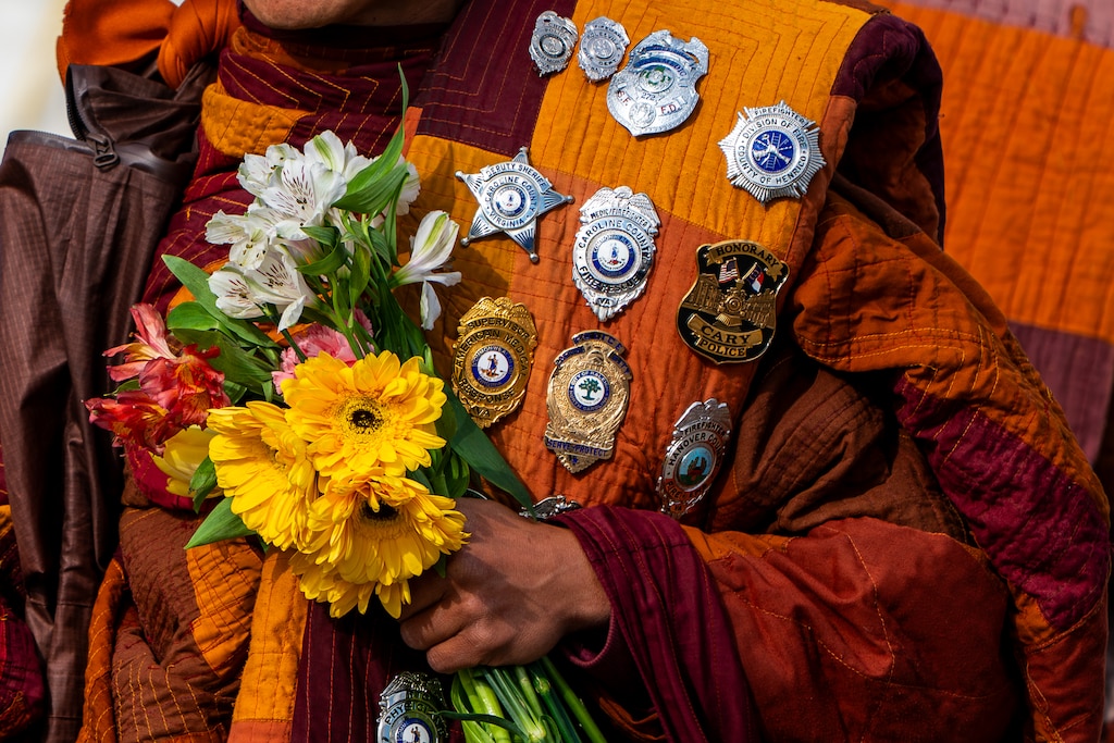 THURSDAY, FEBRUARY 12, 2026 - "Walk For Peace" Theravada Buddhist Monk Venerable Bhikkhu Pannakara has recieved multiple gifts on his 2,300 mile journey which include military and police pins along with flowers.