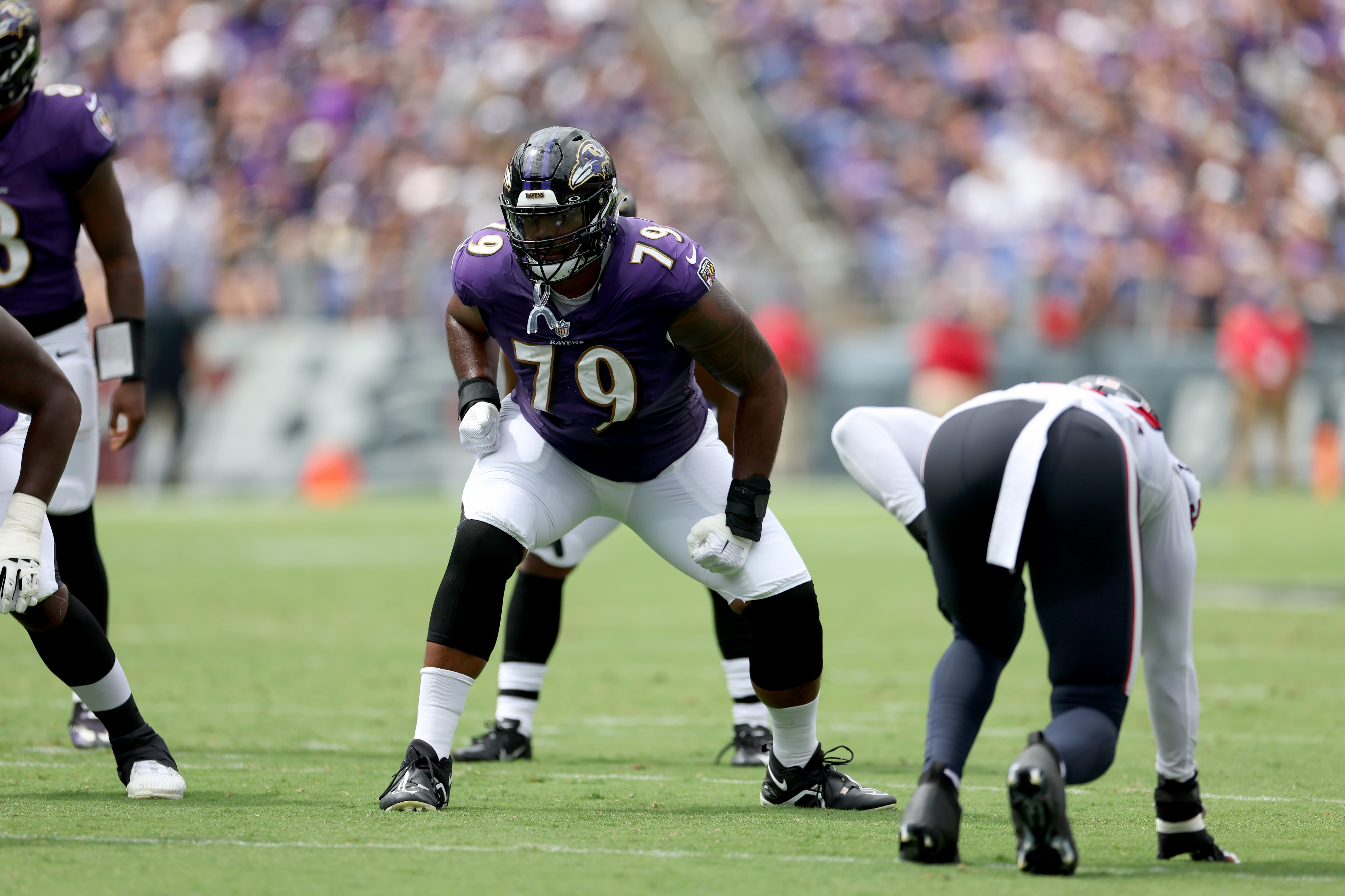 Ronnie Stanley #79 of the Baltimore Ravens lines up against the Houston Texans defense at M&T Bank Stadium on September 10, 2023 in Baltimore, Maryland.