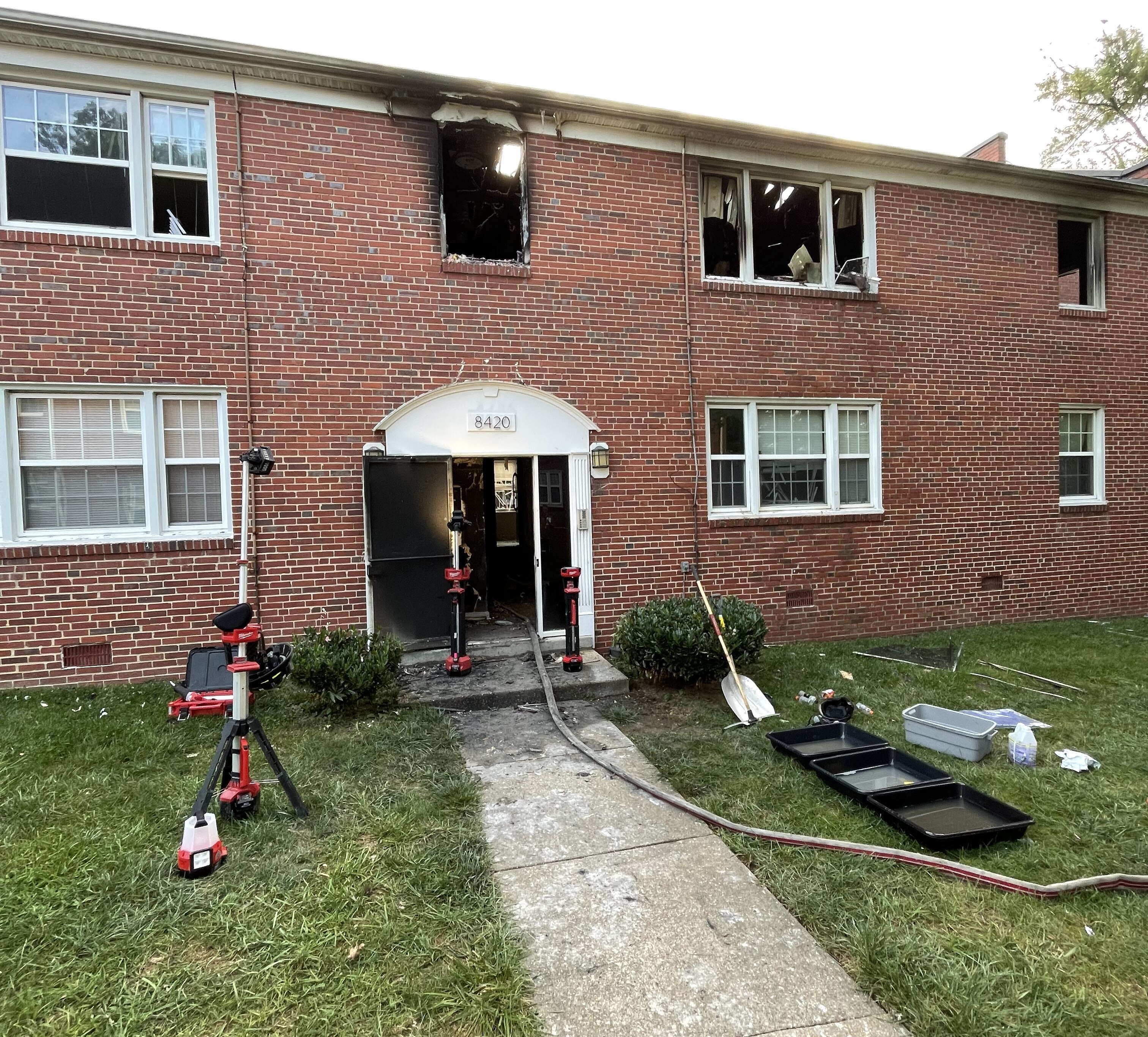 The scene Monday morning after an overnight apartment fire in Towson left one man dead and a woman and three children injured.