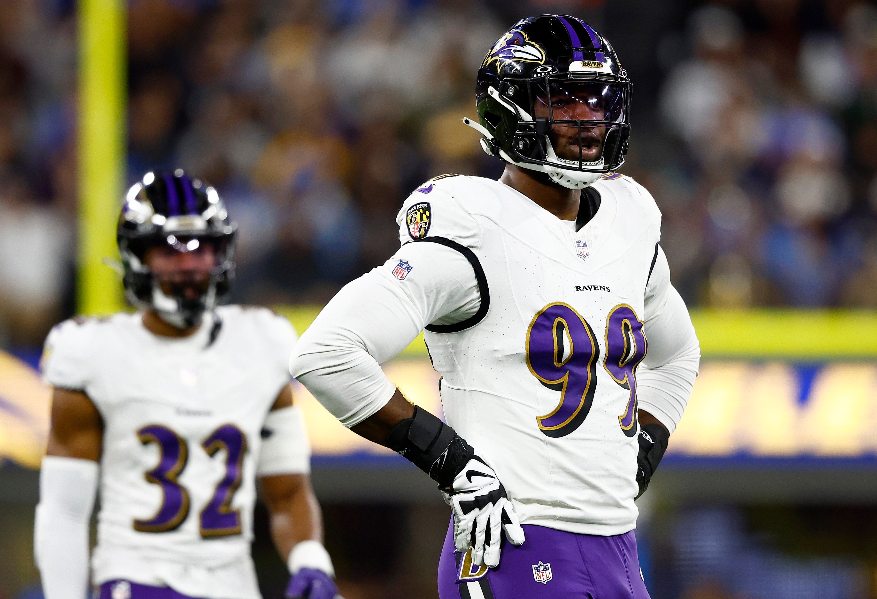Odafe Oweh #99 of the Baltimore Ravens reacts against the Los Angeles Chargers during the second quarter in the game at SoFi Stadium on Nov. 26, 2023, in Inglewood, California.