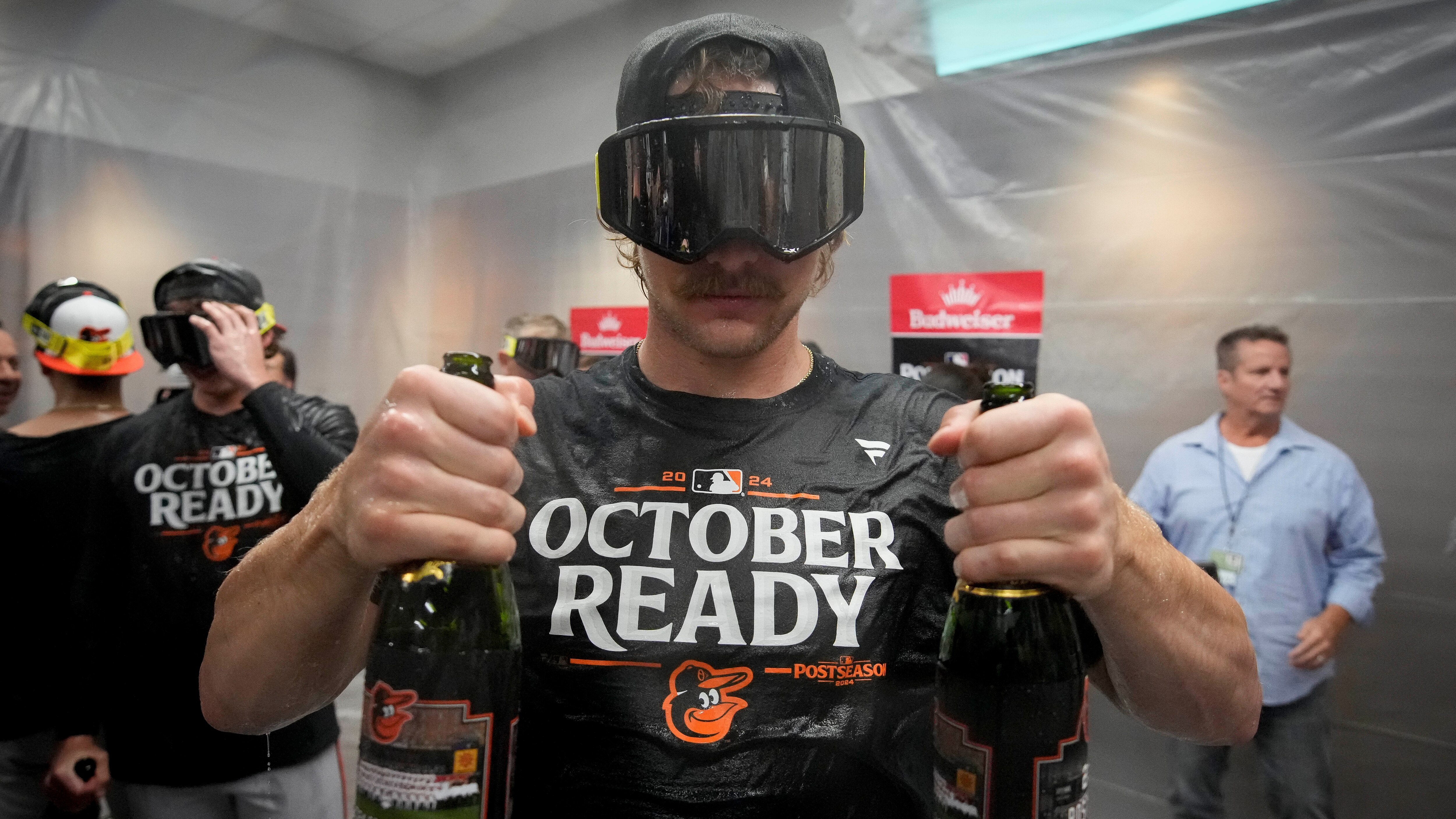 Baltimore Orioles' Gunnar Henderson celebrates after the team clinched a playoff berth by defeating the New York Yankees in baseball game, Tuesday, Sept. 24, 2024, in New York. (AP Photo/Bryan Woolston)