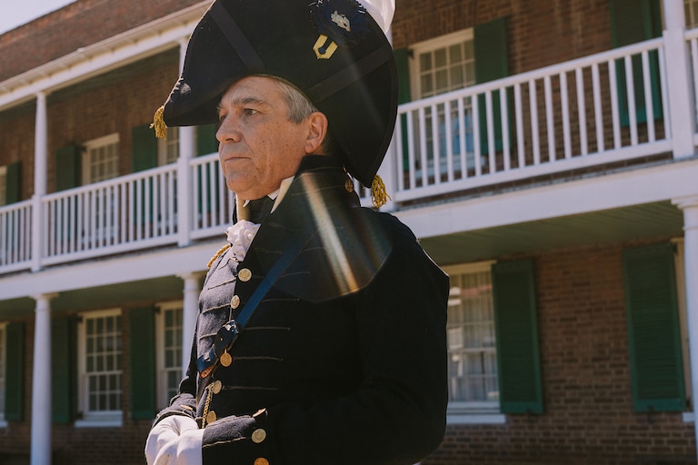Brian Alexander, dressed in full commander uniform, explained how Americans traditionally wore their hats tilted to the side, unlike the French and British on September 8th, 2024, at Fort McHenry in Baltimore City.