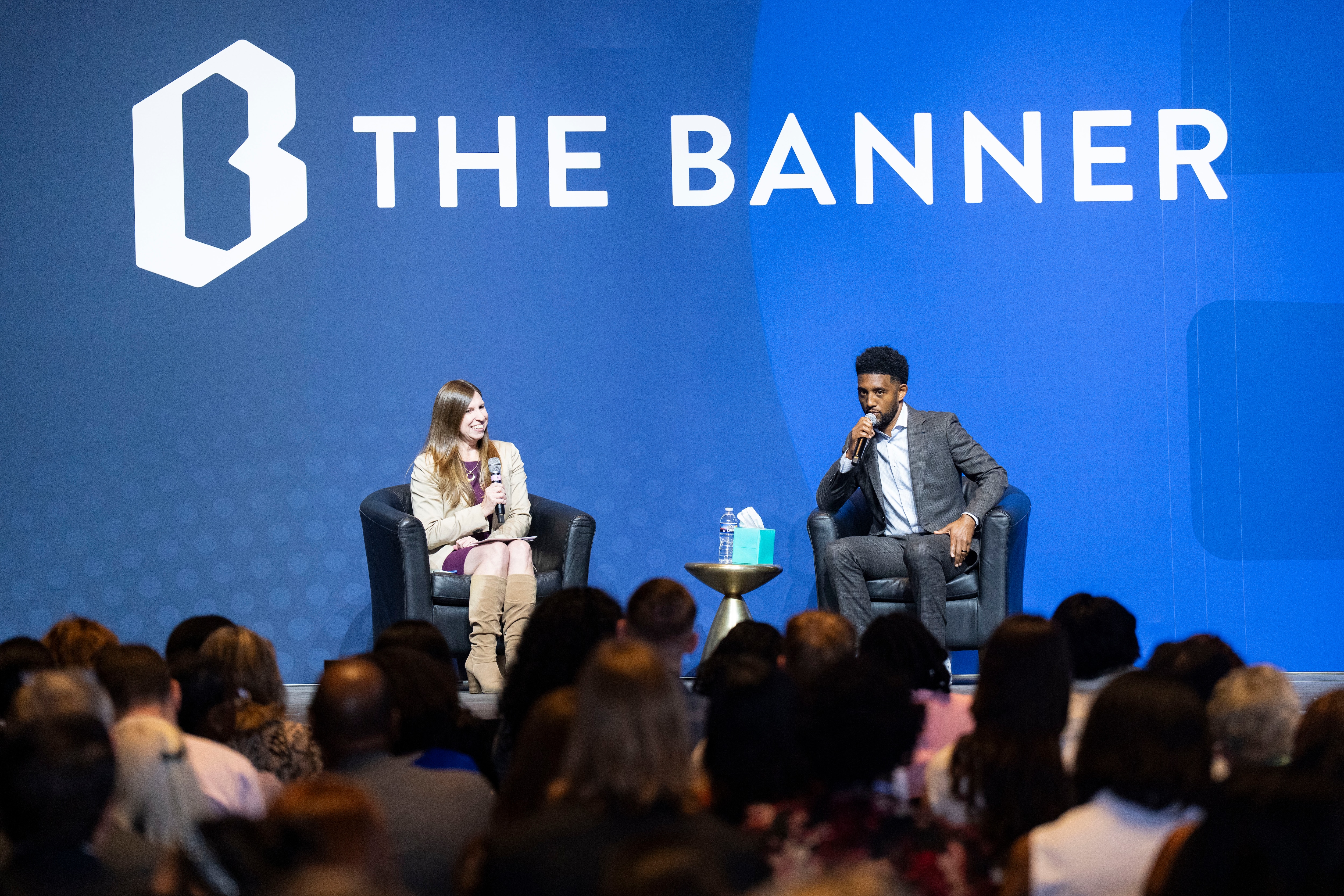 Moderator Emily Opilo, a Baltimore City Hall Reporter at The Banner, has a conversation with Mayor Brandon Scott during Impact Maryland.
