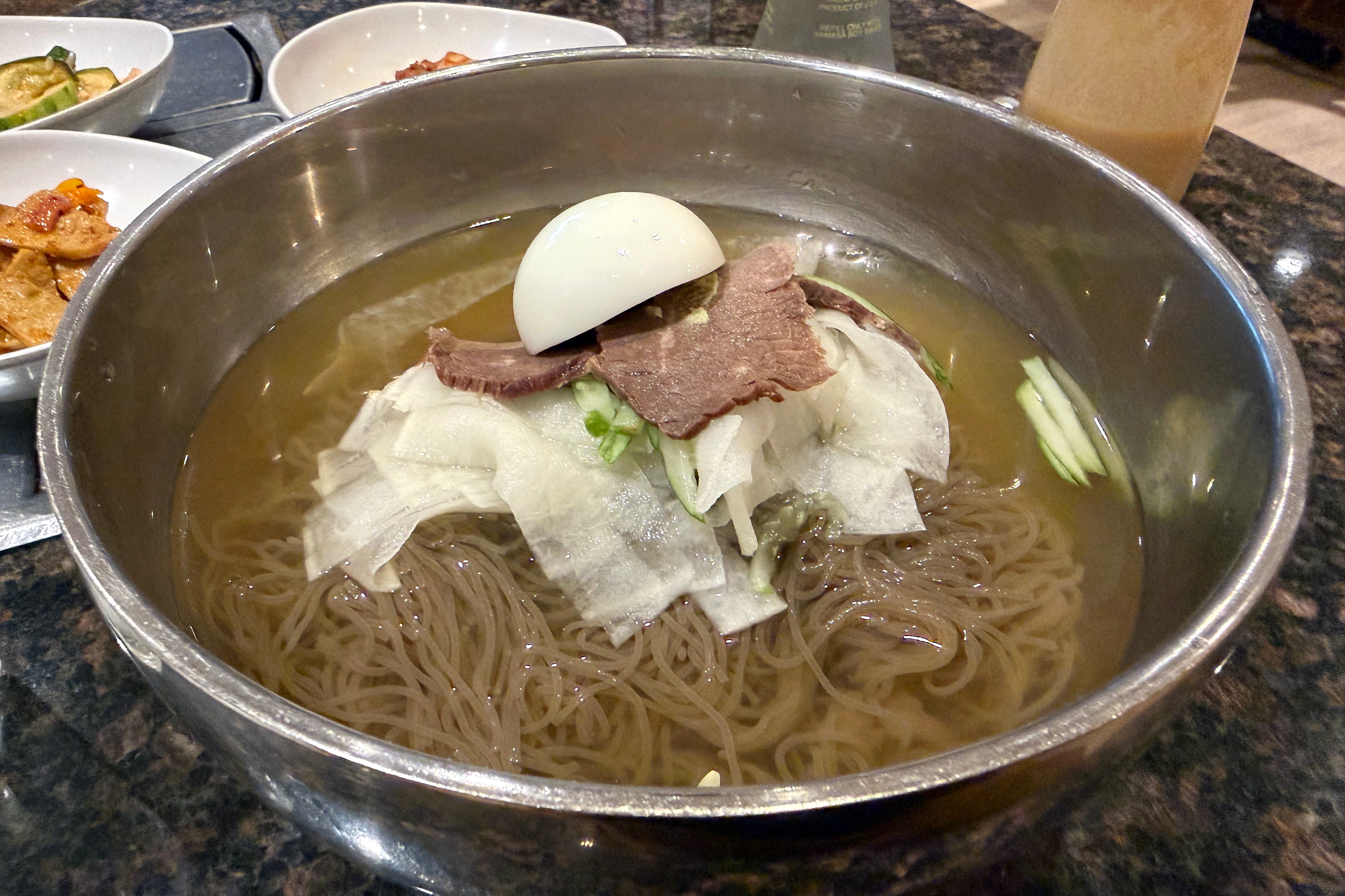 Gah Rahm in Beltsville serves mul naengmyeon, an icy cold Korean noodle dish, alongside staples such as meats grilled at your table.