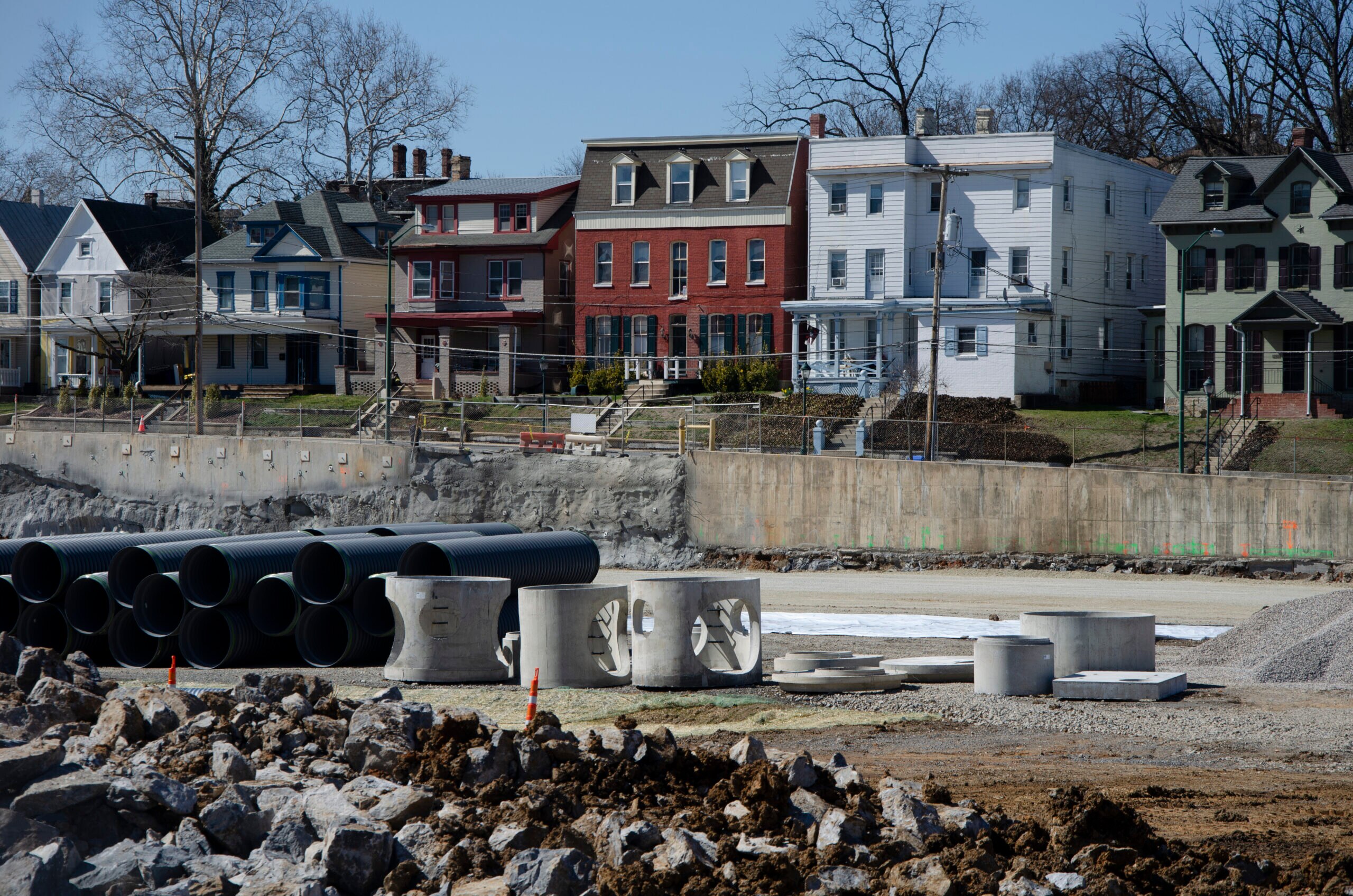 A row of houses on Hagerstown's Summit Avenue overlook the construction for the new baseball stadium. (Bridget Byrne/The Shirley Povich Center for Sports Journalism)