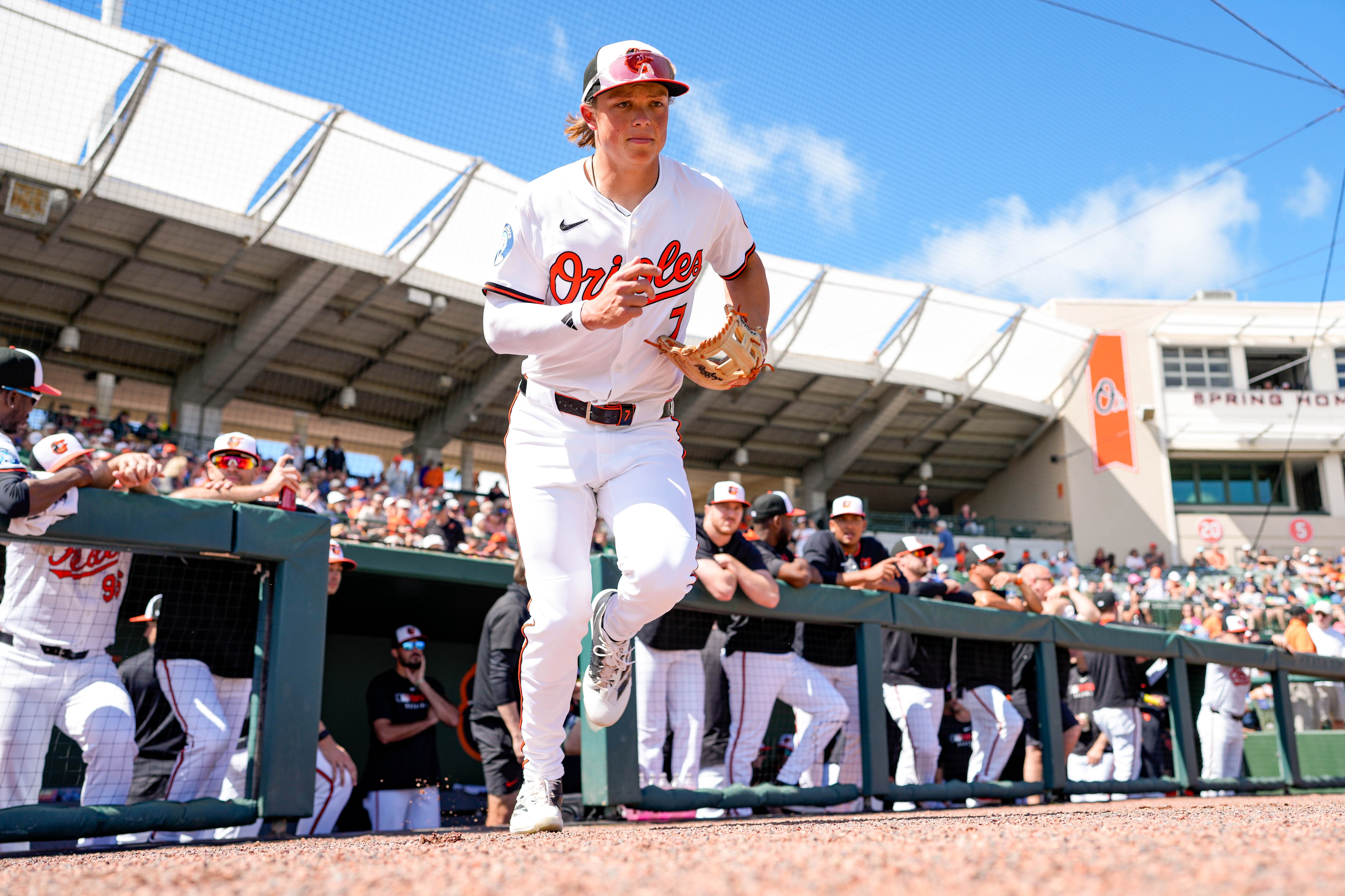 Jackson Holliday (7) takes the field ahead of a Grapefruit League game against the Detroit Tigers last month.