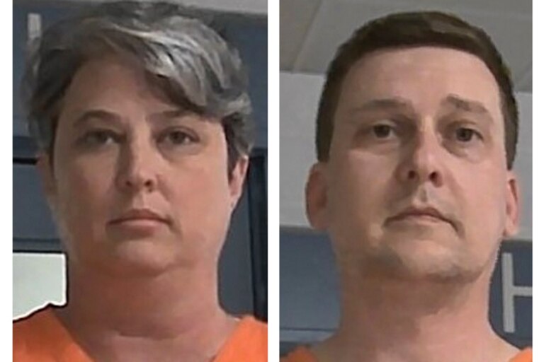 FILE - These booking photos released Oct. 9, 2021, by the West Virginia Regional Jail and Correctional Facility Authority show Diana Toebbe, left, and Jonathan Toebbe. A judge cited the “great danger” that the Navy engineer and his wife placed on the United States in sentencing them to lengthy prison terms Wednesday, Nov. 9, 2022, for a plot to sell secrets about nuclear-submarines to what they thought was a foreign government.