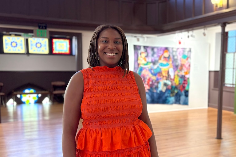 Martina Dodd, curator of collections & exhibitions at the Banneker-Douglas-Tubman Museum, stands in the "She Speaks" exhibit in Annapolis on June 30, 2026.