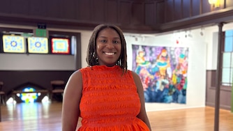 Martina Dodd, curator of collections & exhibitions at the Banneker-Douglas-Tubman Museum, stands in the "She Speaks" exhibit in Annapolis on June 30, 2026.