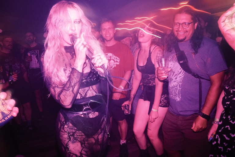 Vocalist, Josephine Olivia, in VOSH moves through crowd during their performance at Subscape at The Crown on August 3, 2024.