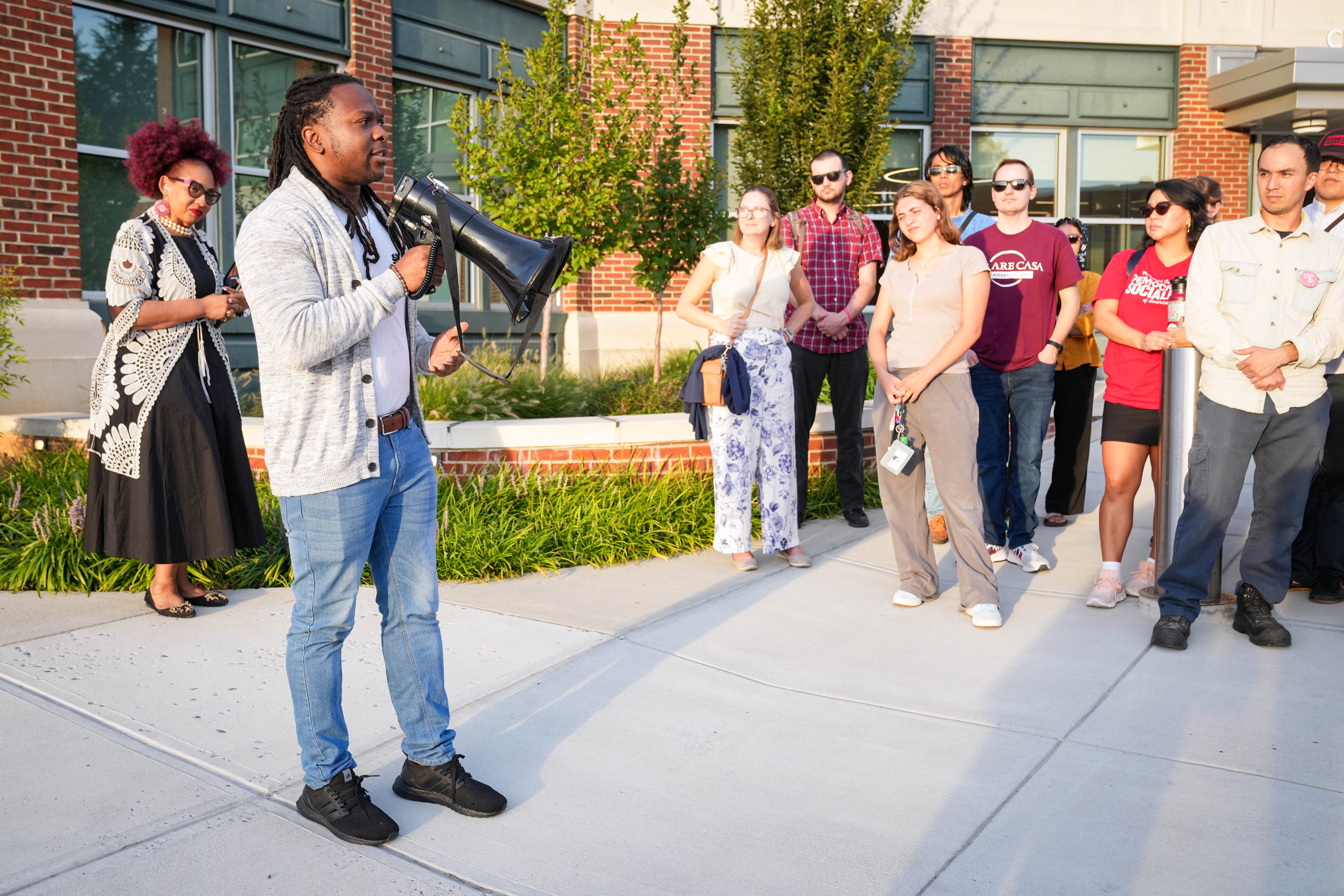 A new federal lawsuit challenges what plaintiffs describe as the Trump administration’s “arrest first, ask questions later” policy. Omodamola Williams, a Gaithersburg resident, gives remarks on protecting the region’s immigrant community Tuesday.