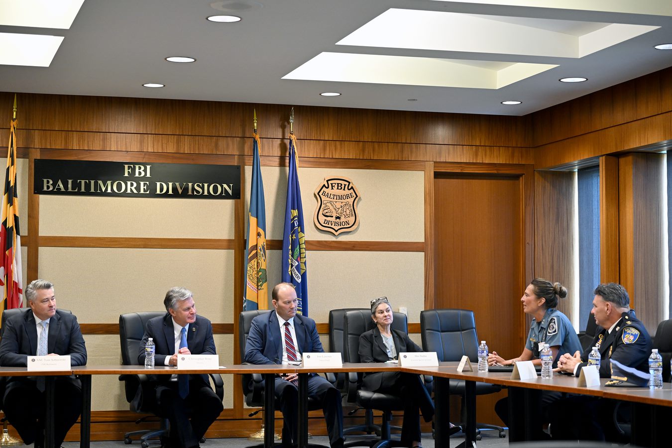 FBI Director Christopher Wray, second from left, visited the bureau’s Baltimore field office to meet with local law enforcement partners and receive updates on cases. At right, Acting Anne Arundel County Police Chief Katherine Roberts and Acting Baltimore Police Commissioner Richard Worley.