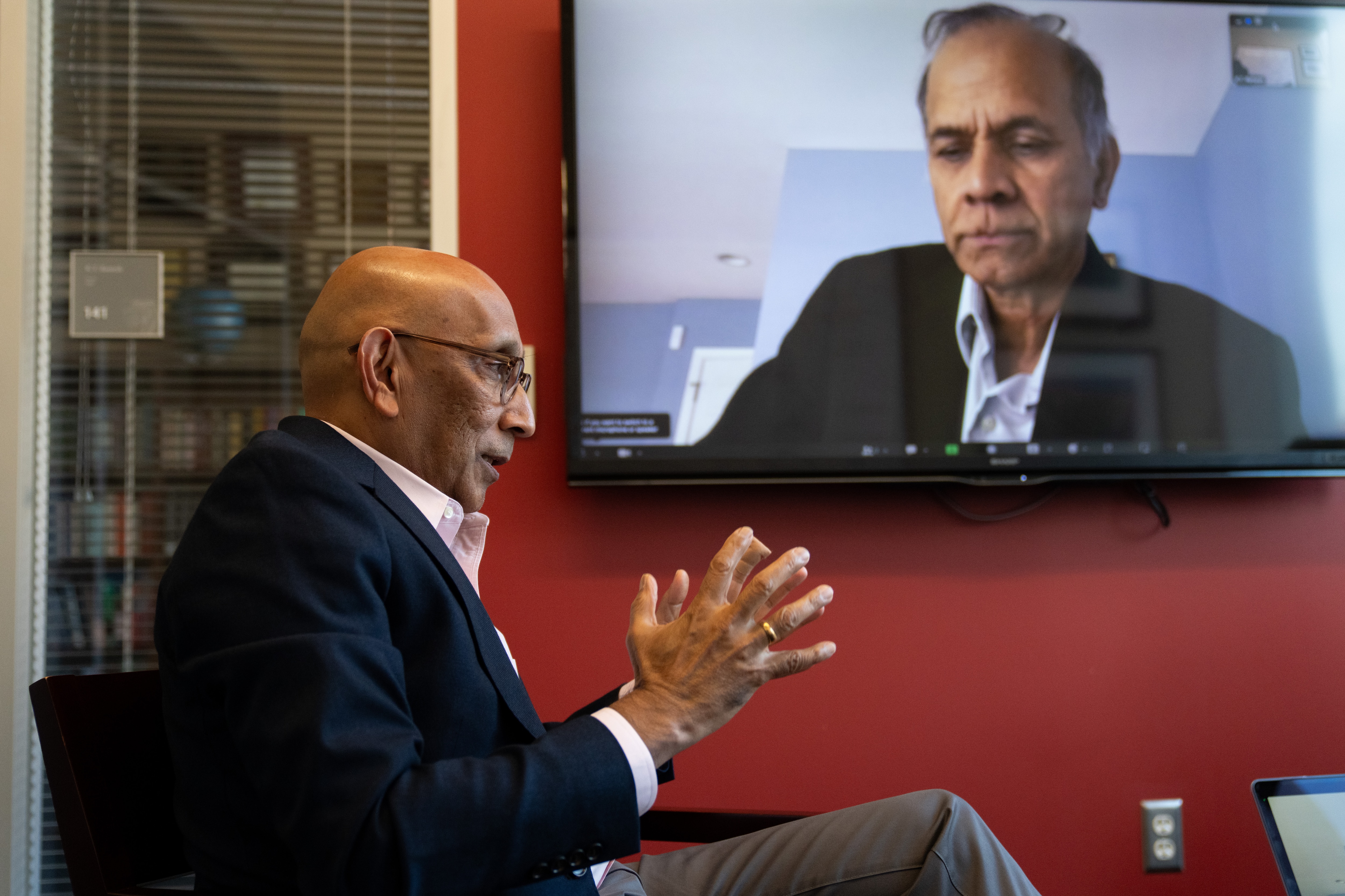 K.T. Ramesh, interim co-director of Johns Hopkins University’s new data science and translation institute, speaks as fellow co-Director Rama Chellappa listens via video chat at the University’s Homewood campus on Tuesday, Nov. 7, 2023.