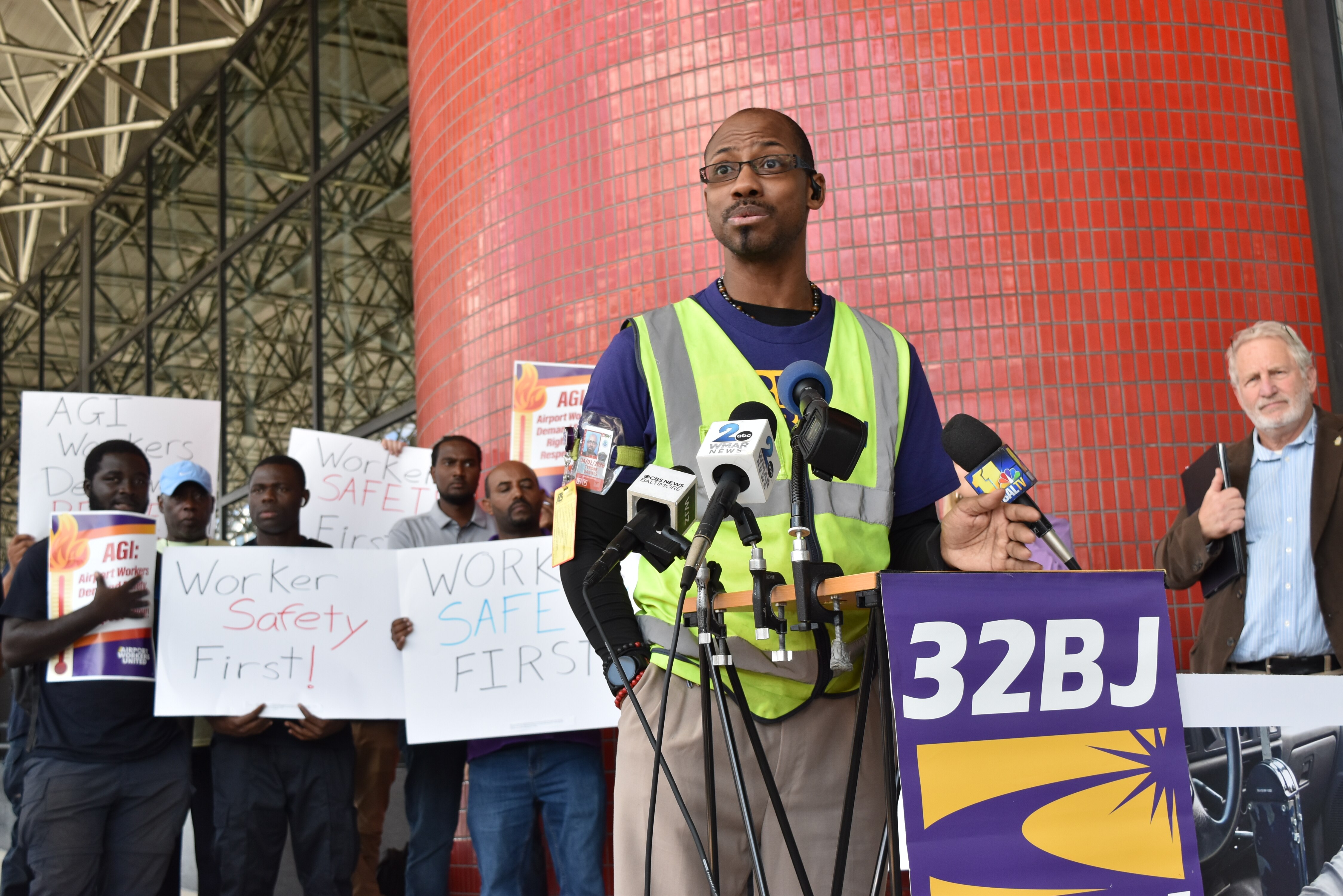 Tyrone Daniels, an AGI ground crew employee, speaks at Baltimore-Washington International Thurgood Marshall Airport