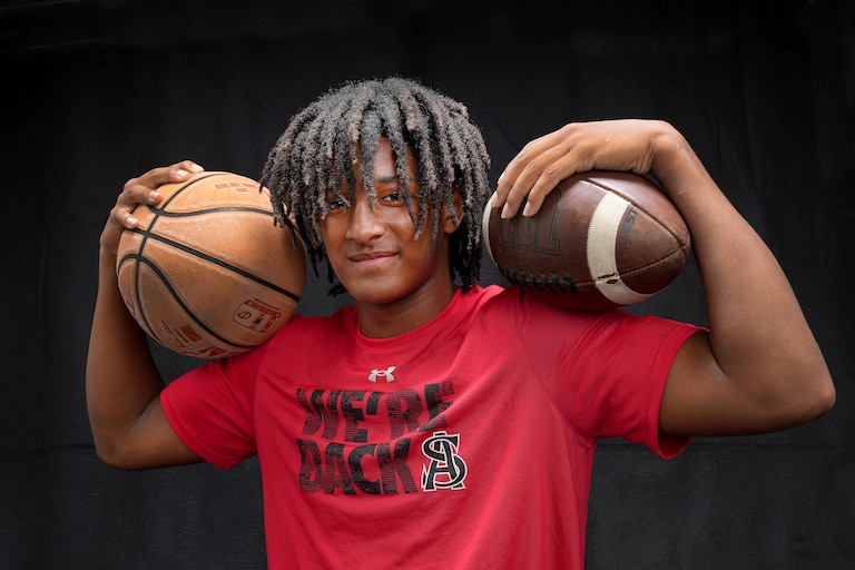 Malik Washington is a rising sophomore at Archbishop Spalding. In addition to being an excellent basketball player who will play for the Team Melo AAU squad this summer that we are doing a continuing series on, the 6-foot-6, 210-pound 15-year-old is also considered the #1 ranked quarterback in the state of Maryland, with scholarship offers from Penn State, Maryland, Virginia Tech and many more soon to follow.