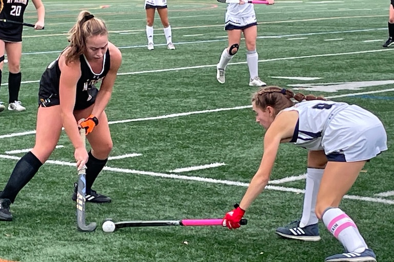Mount Hebron’s Natalie Machiran (left) attempts to play a ball stopped by Marriotts Ridge’s Marin Kriner during Wednesday’s Class 3A East Region I field hockey championship. Macharin scored Mount Hebron’s only goal as top-seeded Marriotts Ridge won, 3-1.