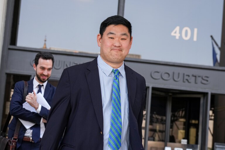 Chris Bendann, 39, exits the Baltimore County Courthouse in Towson with his legal team after a hearing on Tuesday, July 18, 2023. The former Gilman School teacher is accused of sexually abusing a student between 2016 and 2019, and was indicted on 16 counts including sexual abuse of a minor, rape and related offenses.
