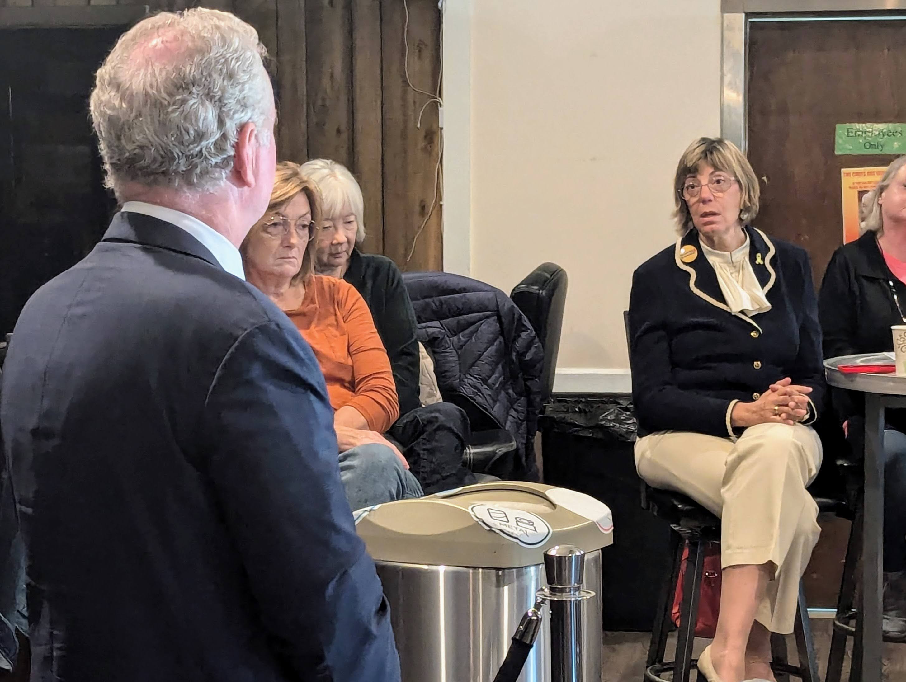 Jennifer Laszlo Mizrahi, a top Democratic donor in Maryland, talks U.S. Sen. Chris Van Hollen during a discussion on the war in Gaza on Oct. 11, 2024 at the Almost 7:30 Democratic Club in Annapolis.