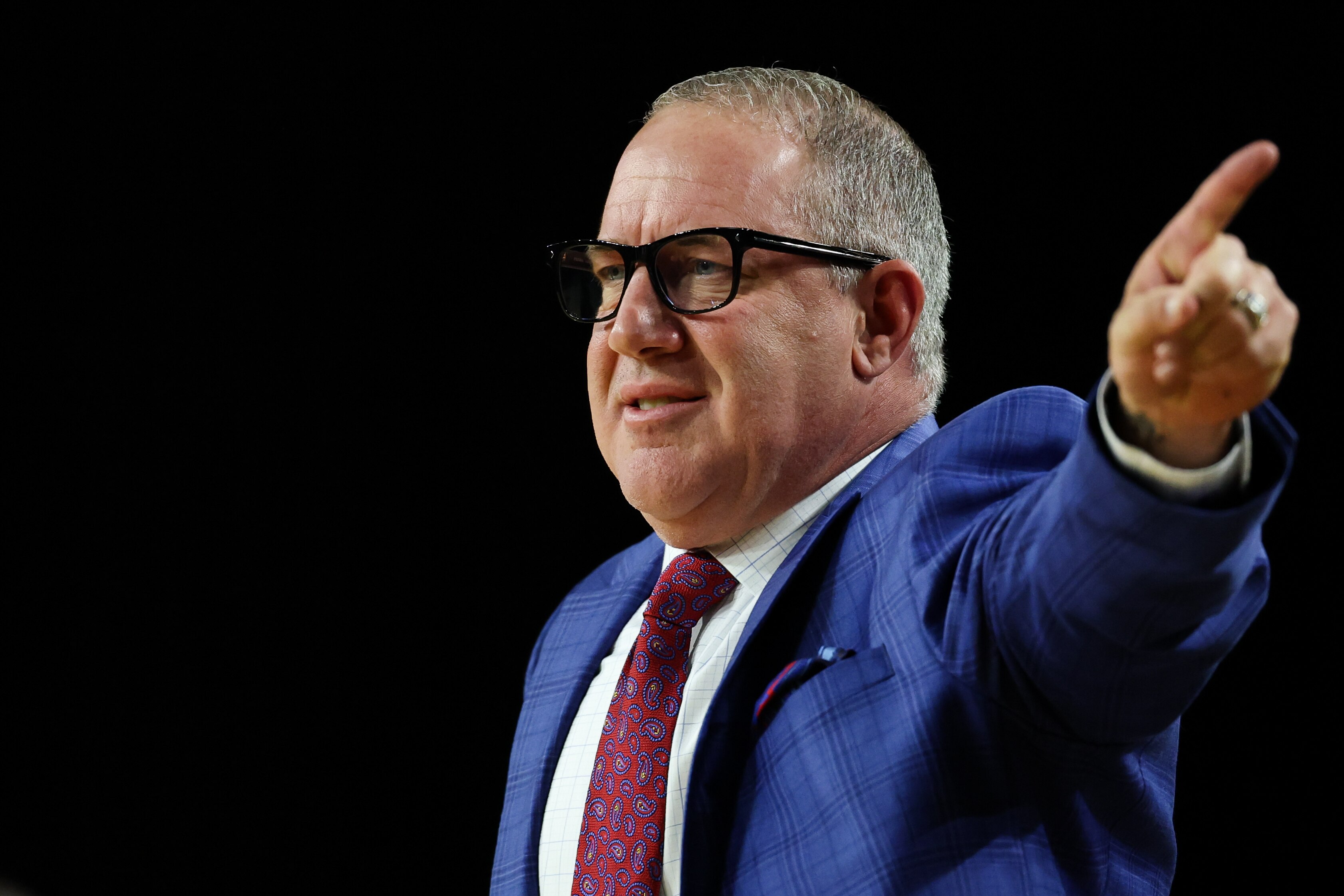 Maryland Terrapins head coach Buzz Williams gives his team instructions from the sideline during the first half of an NCAA basketball game against the Coppin State Eagles, Monday, November 3, 2025, at CFG Bank Arena.