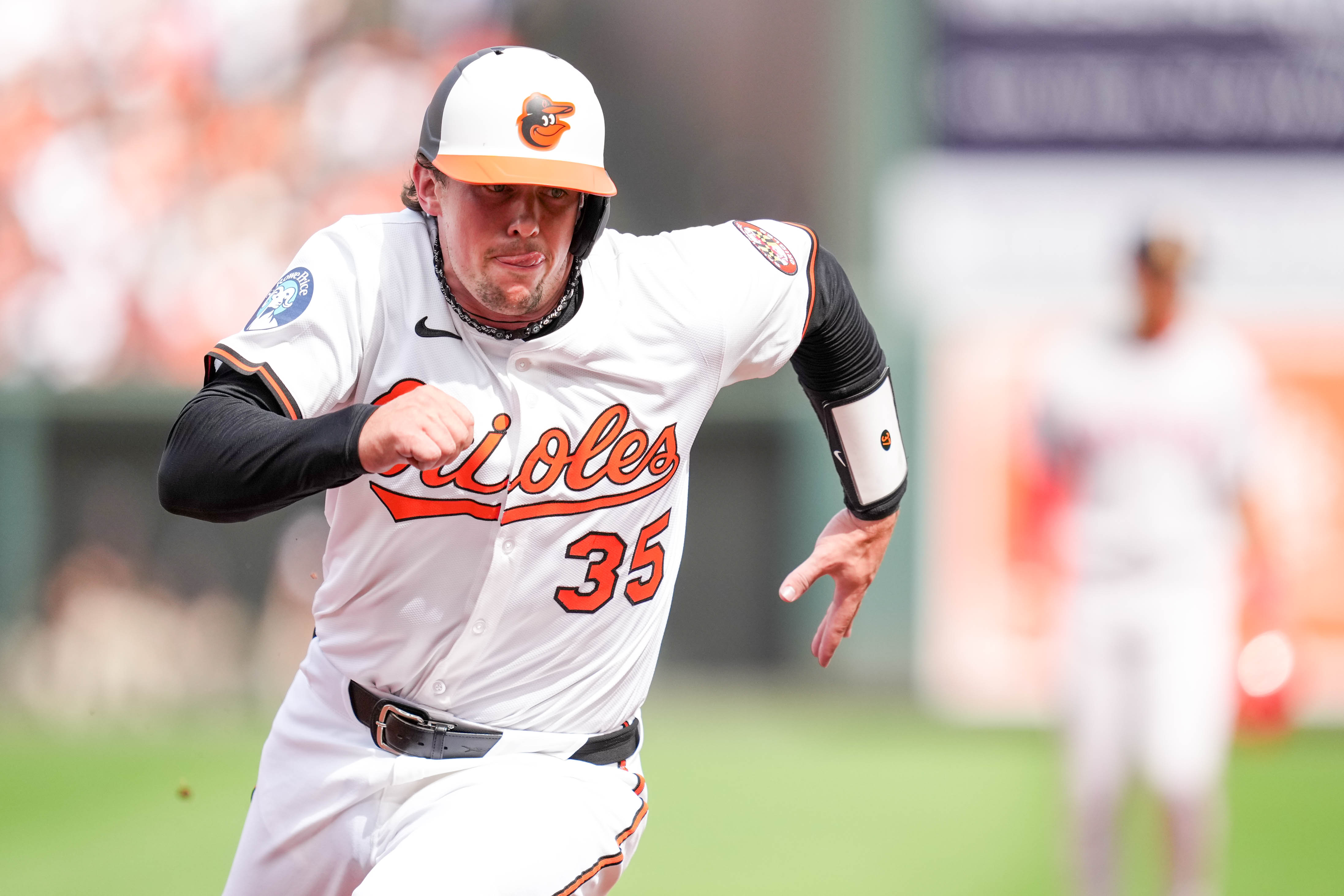 Baltimore Orioles catcher Adley Rutschman (35) runs to home plate to score a run in the team’s home opening game against the Boston Red Sox at Oriole Park at Camden Yards in Baltimore, Md. on Monday, March 31, 2025.