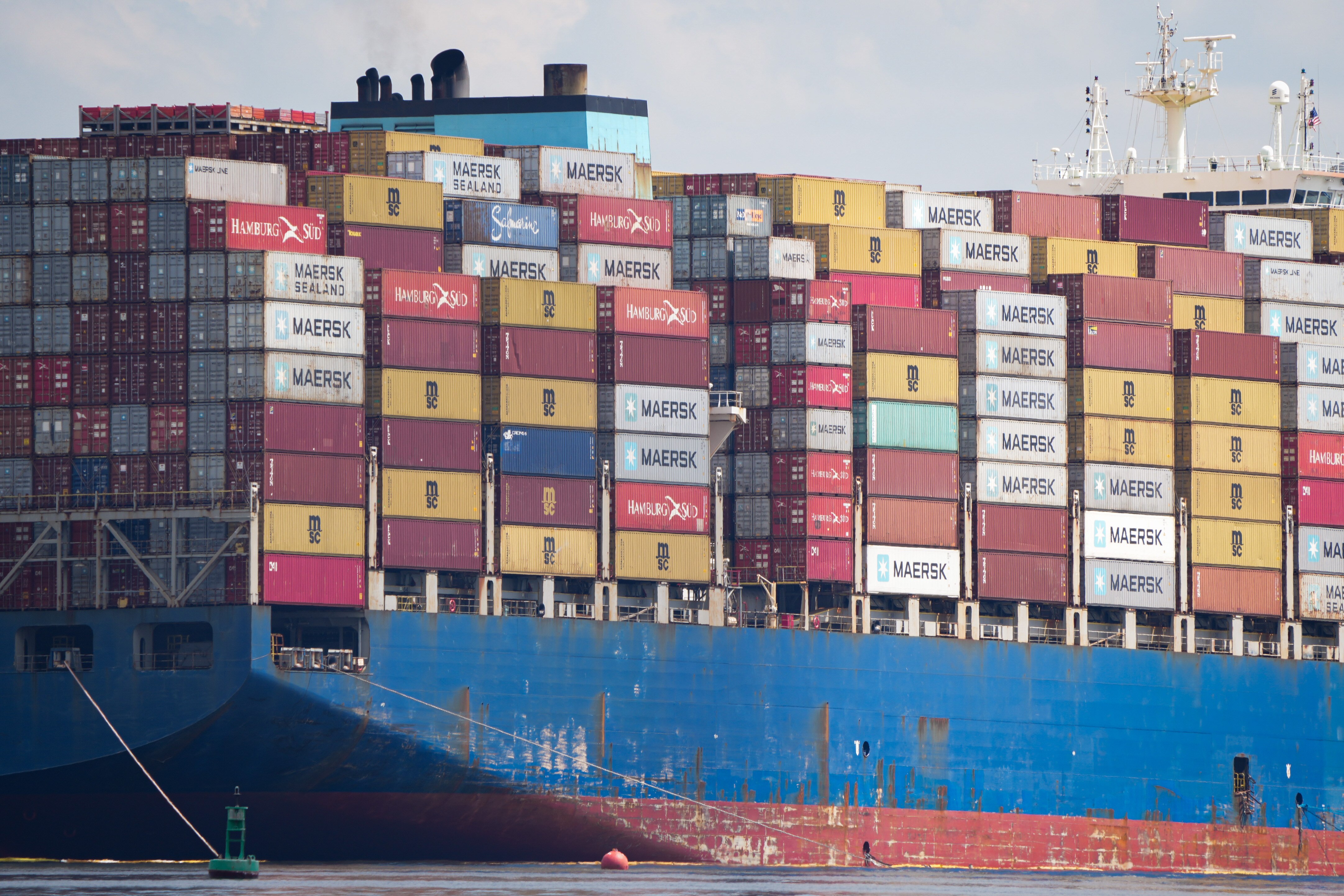 The Dali is seen from a Maryland Department of Natural Resources boat on the Patapsco River in Baltimore on April 10, 2024. Lawyers from Stewart Miller Simmons Trial Attorneys in Atlanta and Kreindler & Kreindler LLP in New York on Monday held a news conference and vowed to fight a request from the owner and manager of the 984-foot-long container ship to limit their liability in the disaster.