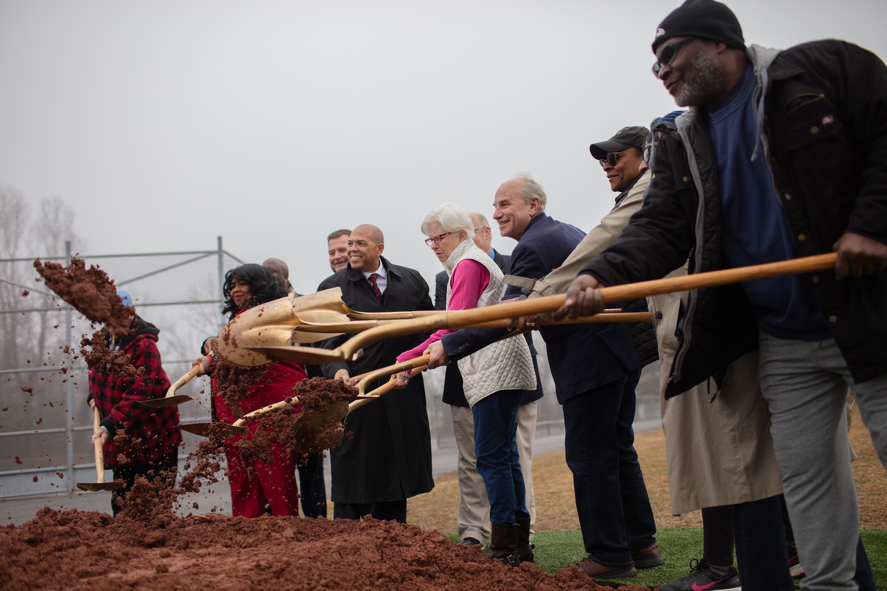 Baltimore County leaders break ground during a ceremony celebrating improvements to Rockdale Park on Friday.