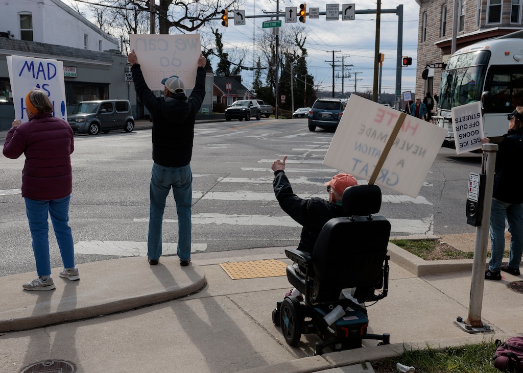 Senior activists meet up every Wednesday on the corner of 40th Street and Roland Avenue in Hampden to protest actions of the Trump administration.