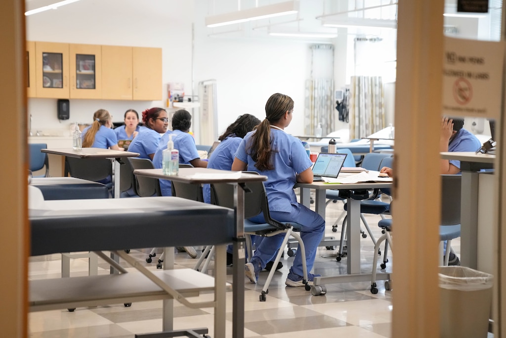 Nursing students are guided by a professor during a simulation exercise at Notre Dame of Maryland University in Baltimore, Md. on Thursday, April 24, 2026.