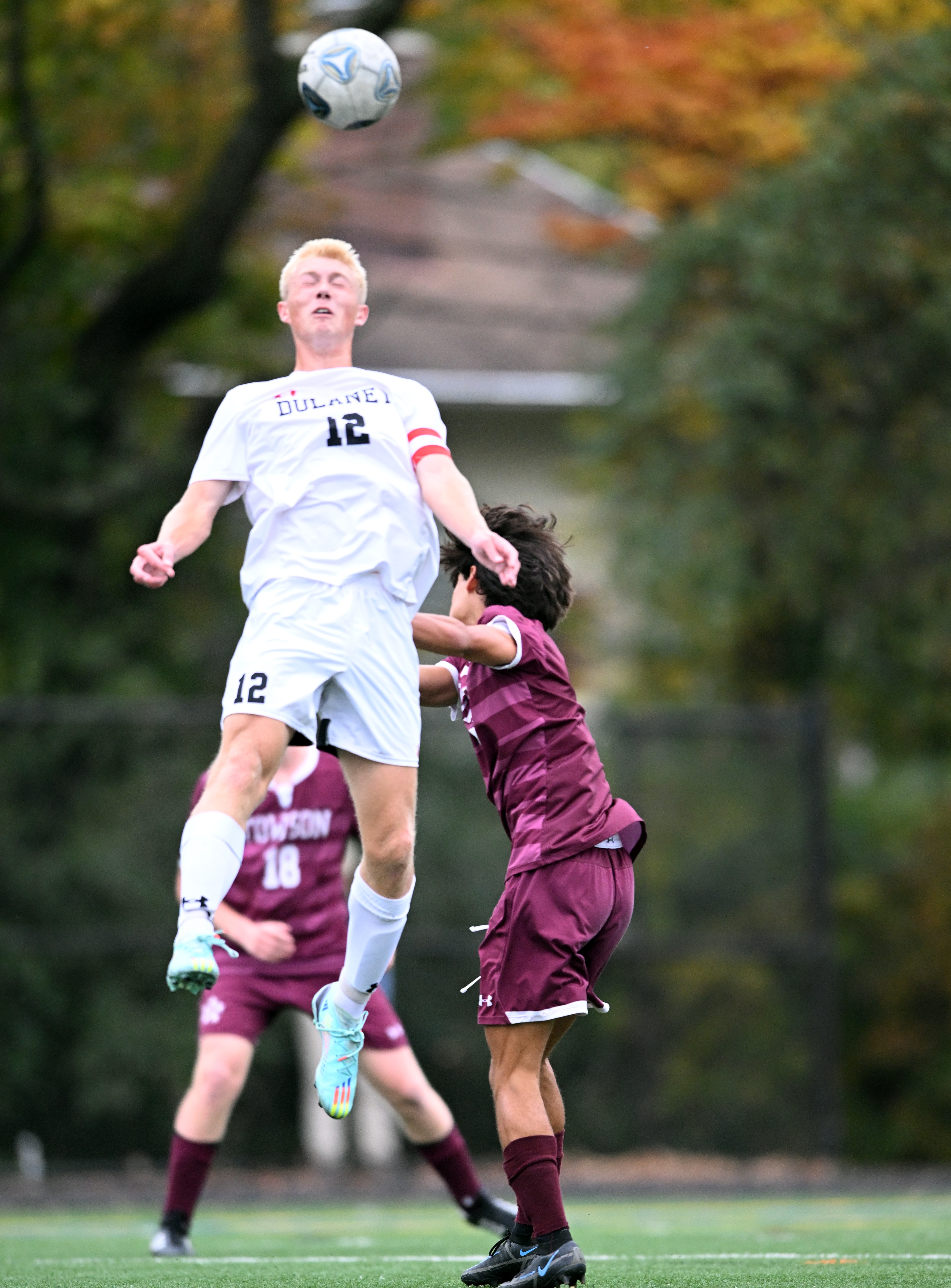 Dulaney's Joe Pinchney heads the soccer ball during last week's Baltimore County championship game against Towson. The Lions along with Towson advance won region final matches Tuesday to advance this weekend's state quarterfinals.