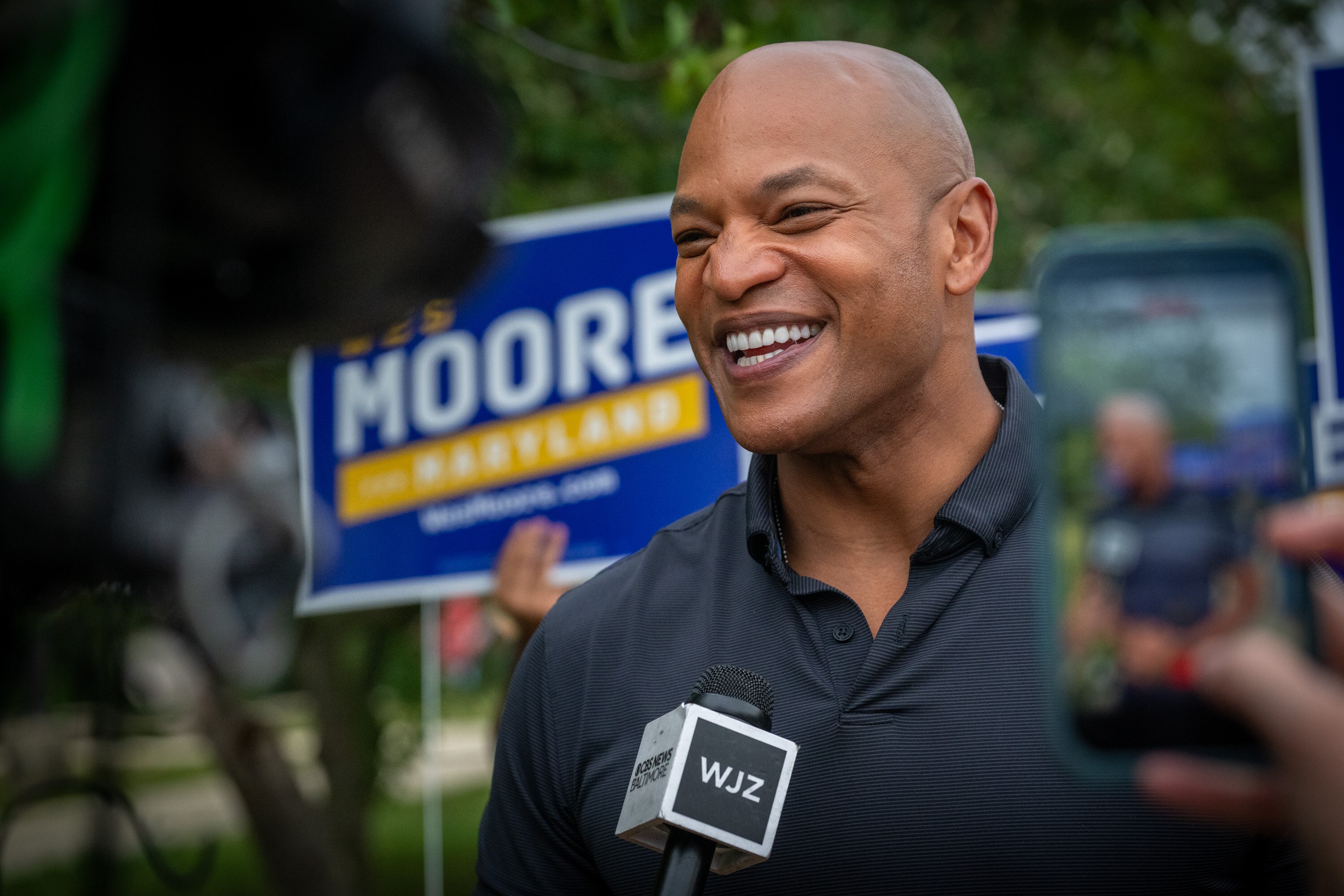 Maryland Governor Wes Moore  talks with the media after voting at Wiley H. Bates Middle School in Annapolis last month. Moore talked about his love of music on “Track Star.” 