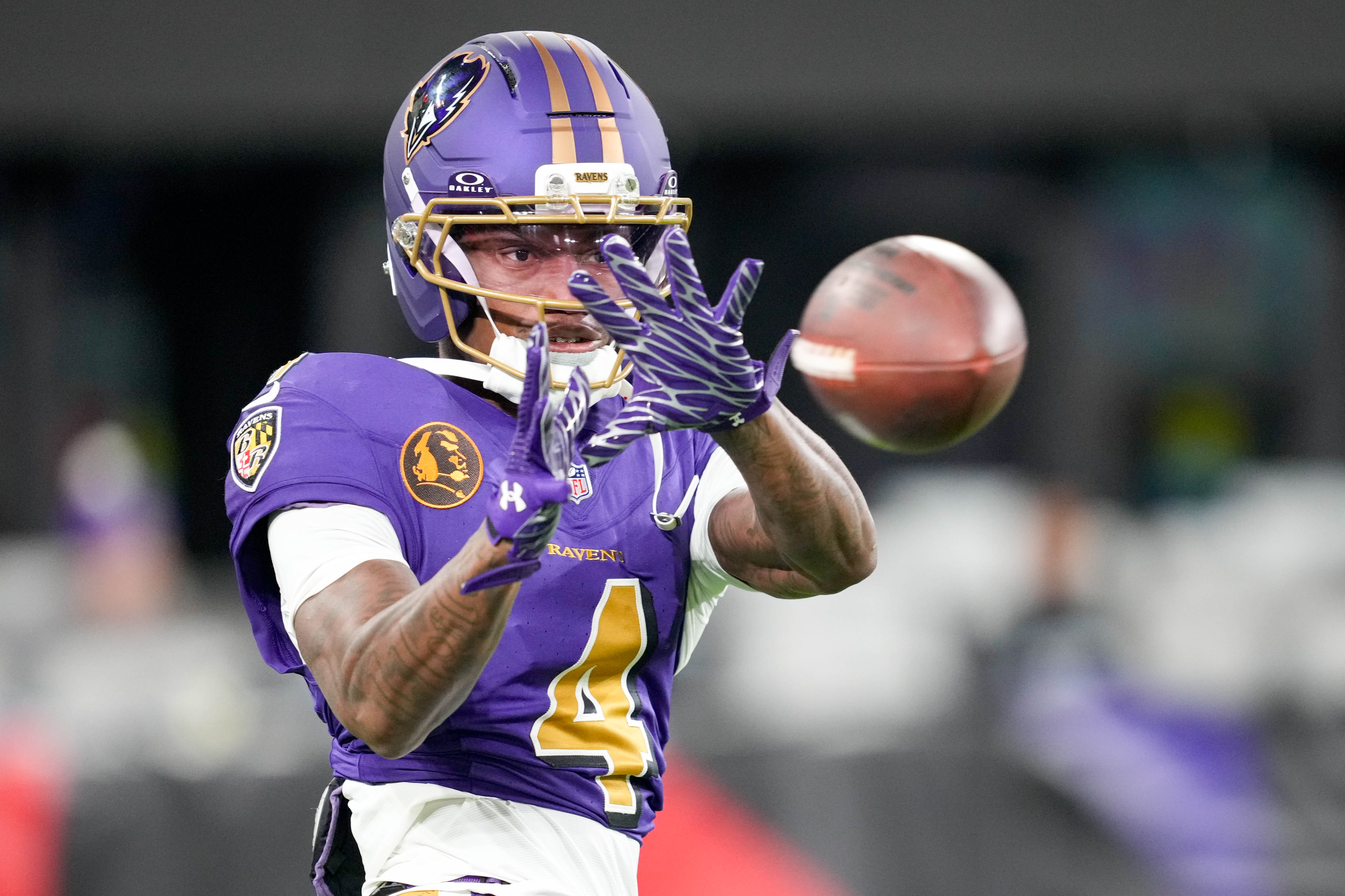 Ravens wide receiver Zay Flowers warms up before a game against the Cincinnati Bengals on Nov. 27, 2025.