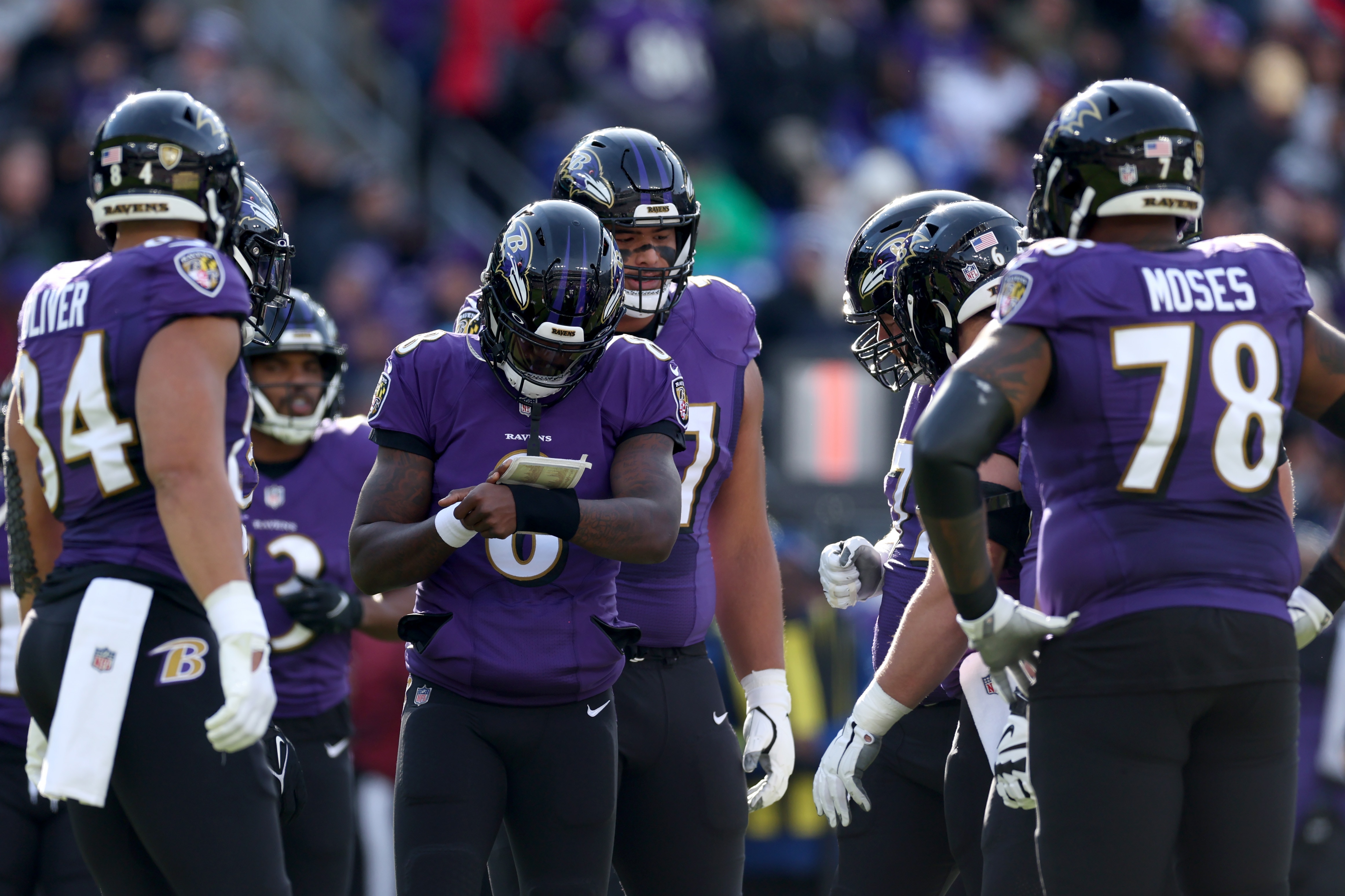 Quarterback Lamar Jackson #8 of the Baltimore Ravens looks on against the Denver Broncos at M&T Bank Stadium on December 04, 2022 in Baltimore, Maryland.