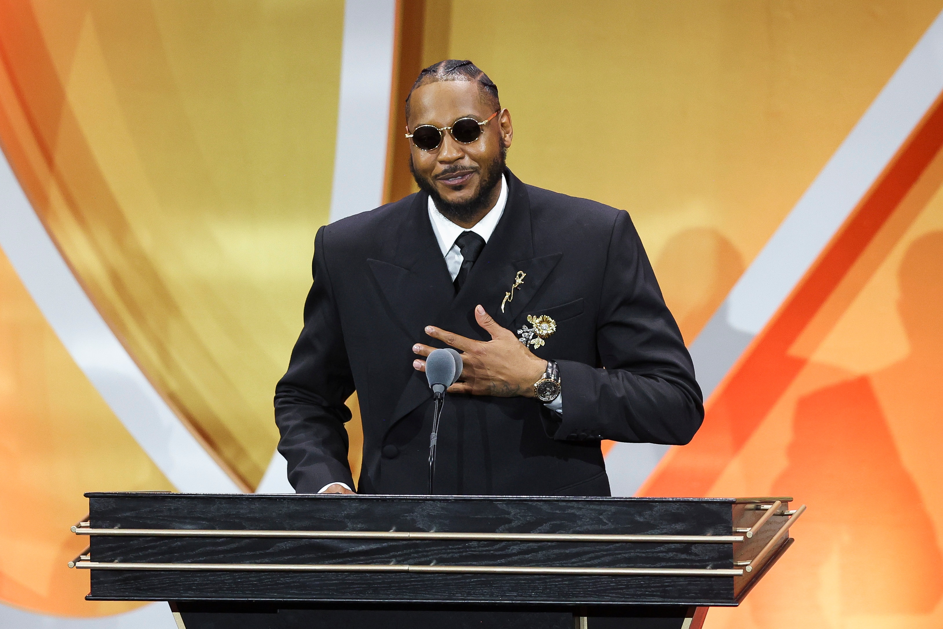 Carmelo Anthony addresses the crowd during the 2025 Basketball Hall of Fame Enshrinement Ceremony on Sept. 6, 2025.