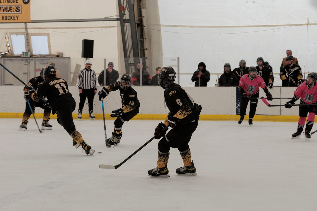 The Baltimore Banners ice hockey team plays against the Team Huss of Reisterstown during the Rink Rally event at the Mimi DiPietro Skating Center.