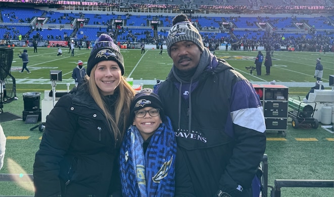 Karla, Karson and Wardell Roberts pose for a picture before the Ravens’ AFC divisional game. (Photo courtesy of Wardell Roberts)