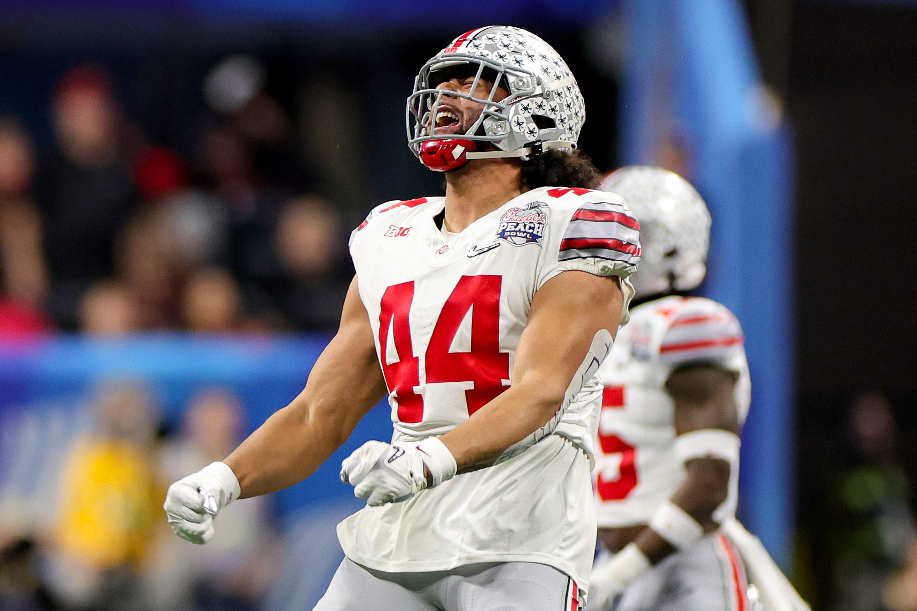 J.T. Tuimoloau is staying at Ohio State for his senior season in part because of a name, image and likeness deal on a signature dandruff shampoo.