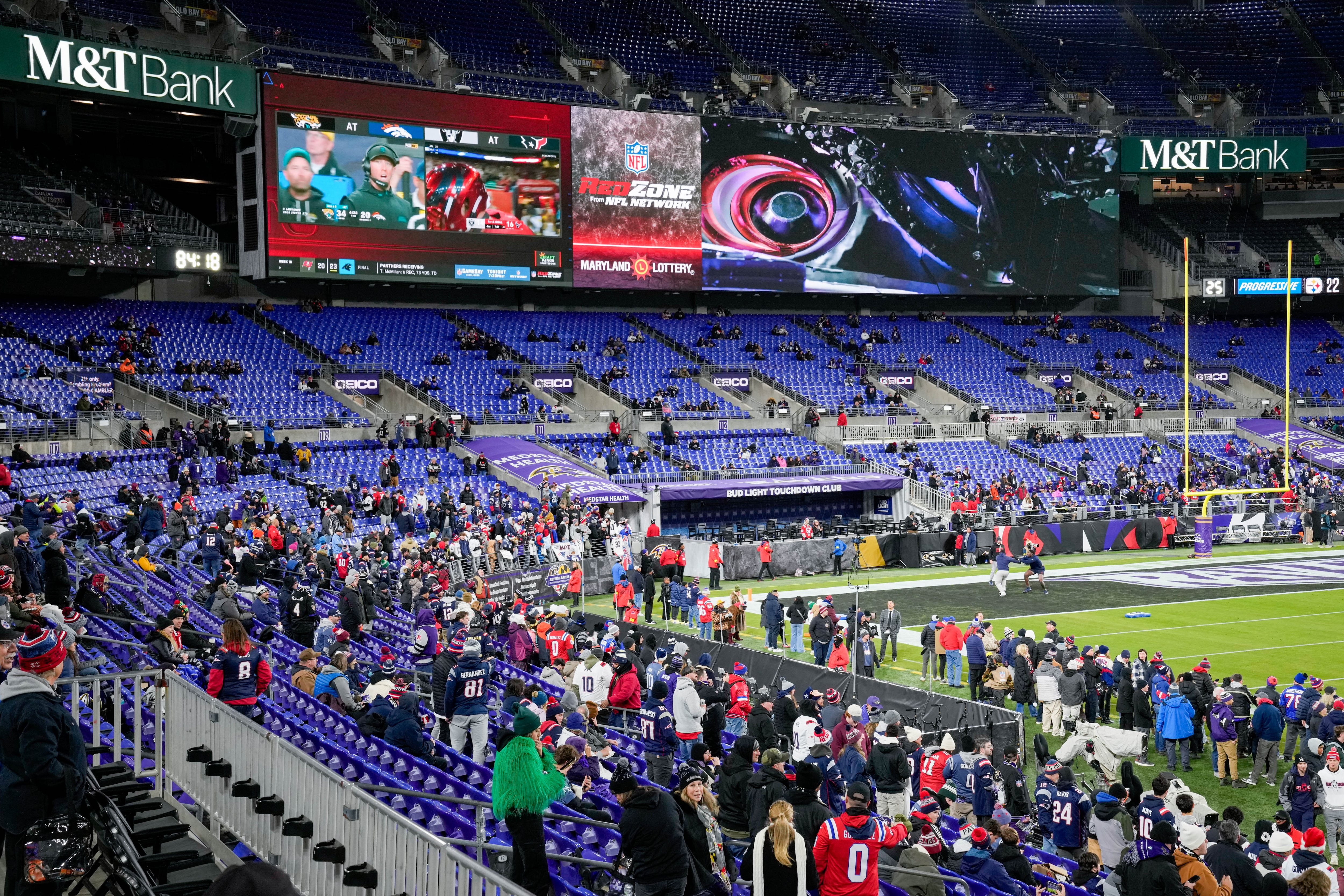 Fans begin to find their seats ahead of a game between the Baltimore Ravens and the New England Patriots in Baltimore last year.